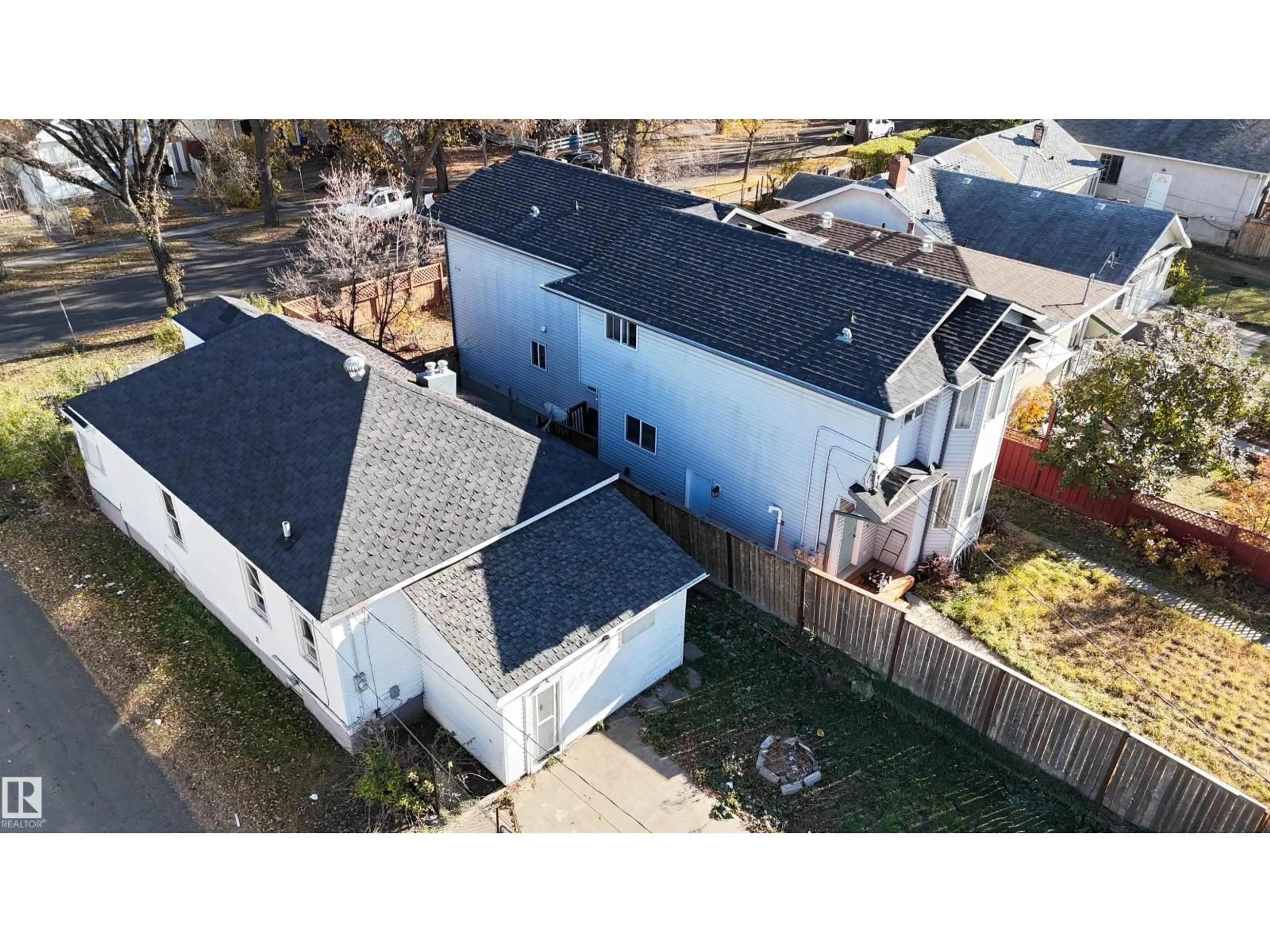 A pic from outside/outdoor area/front of a property/back of a property/a pic from drone, street for 11734 87 ST, Edmonton Alberta T5B3M7
