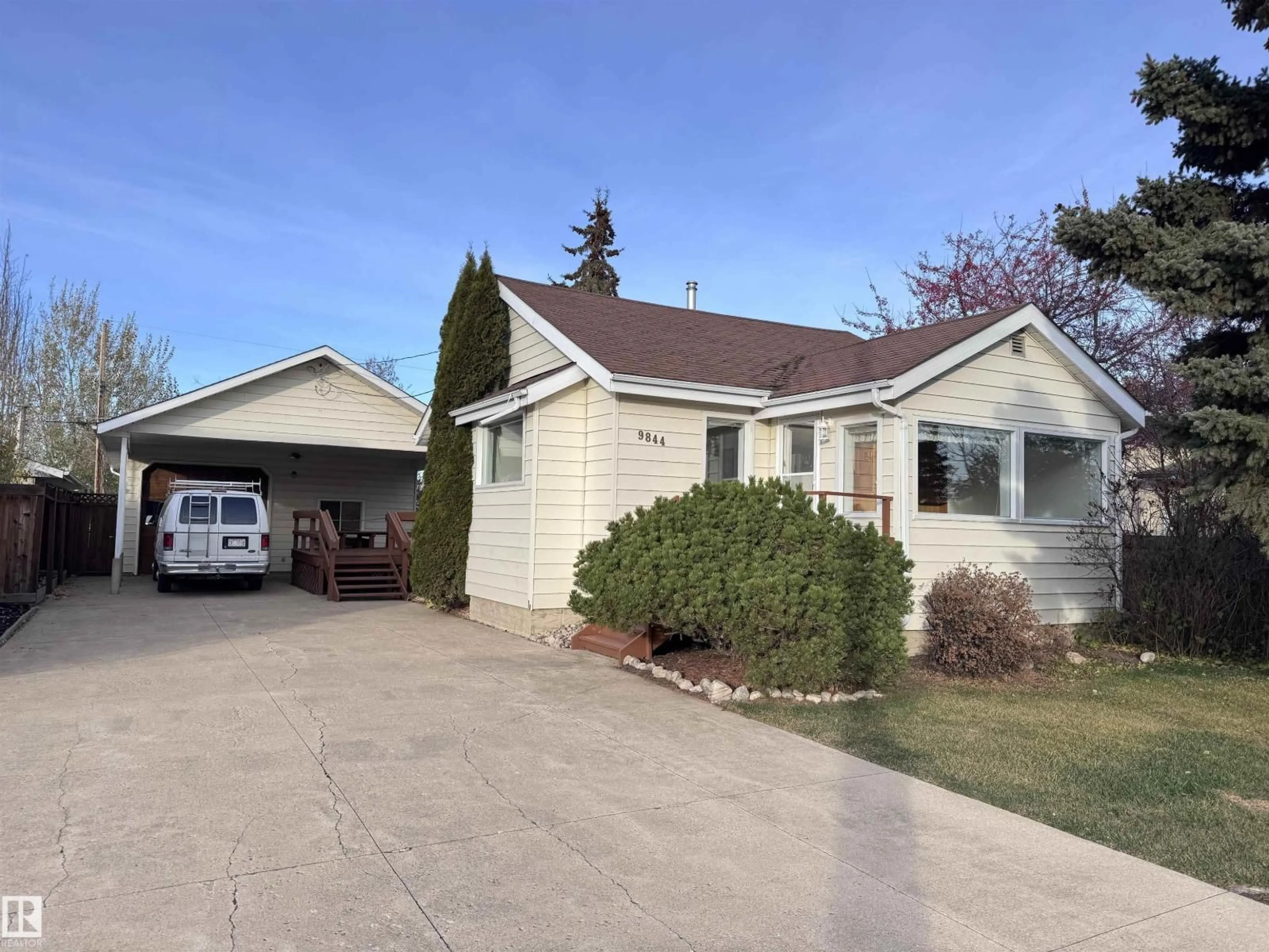 Home with vinyl exterior material, street for 9844 99 ST, Westlock Alberta T7P1Y7