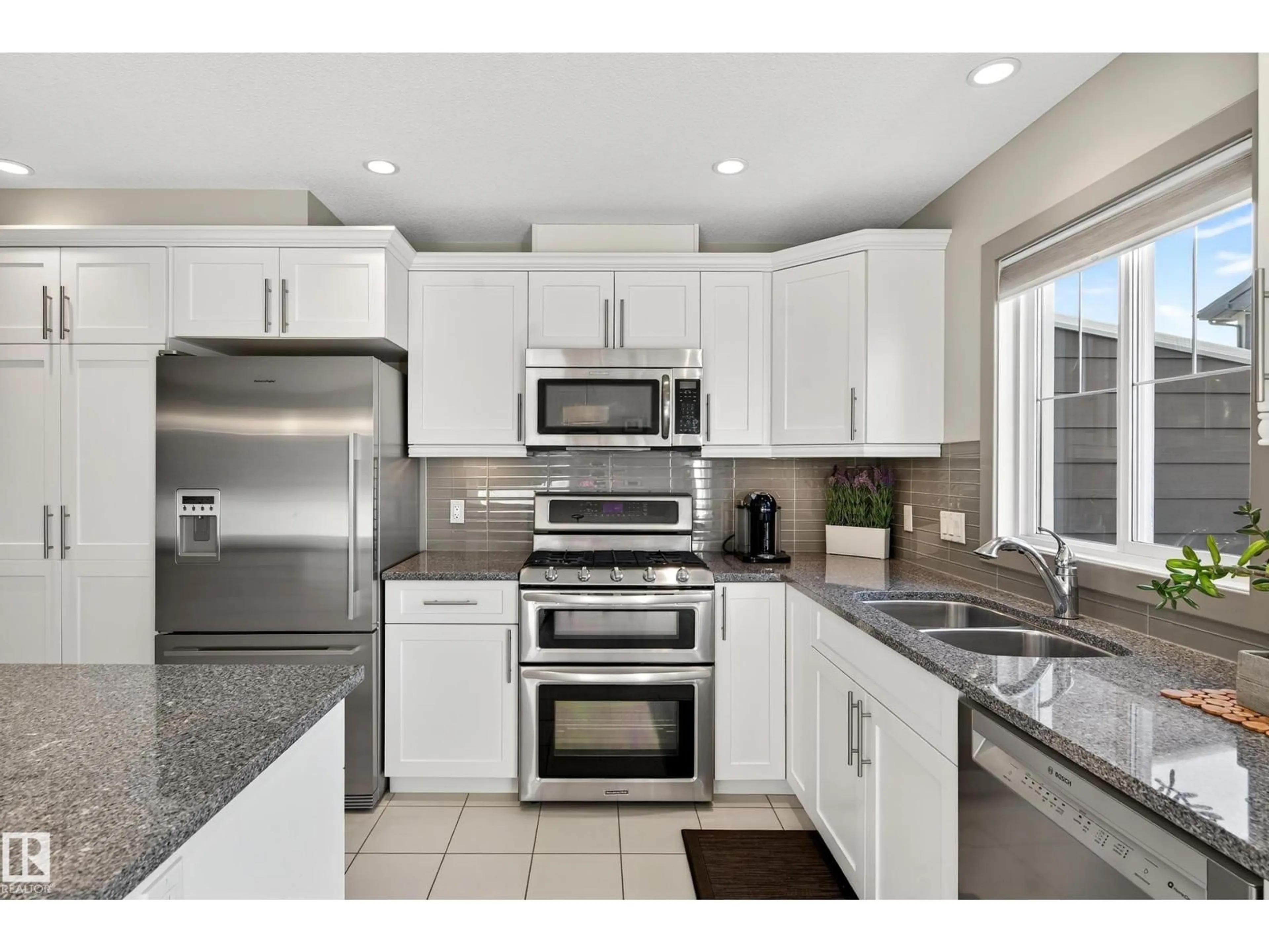 Open concept kitchen, ceramic/tile floor for #6 - 1150 WINDEREMERE WY, Edmonton Alberta T6W2B6