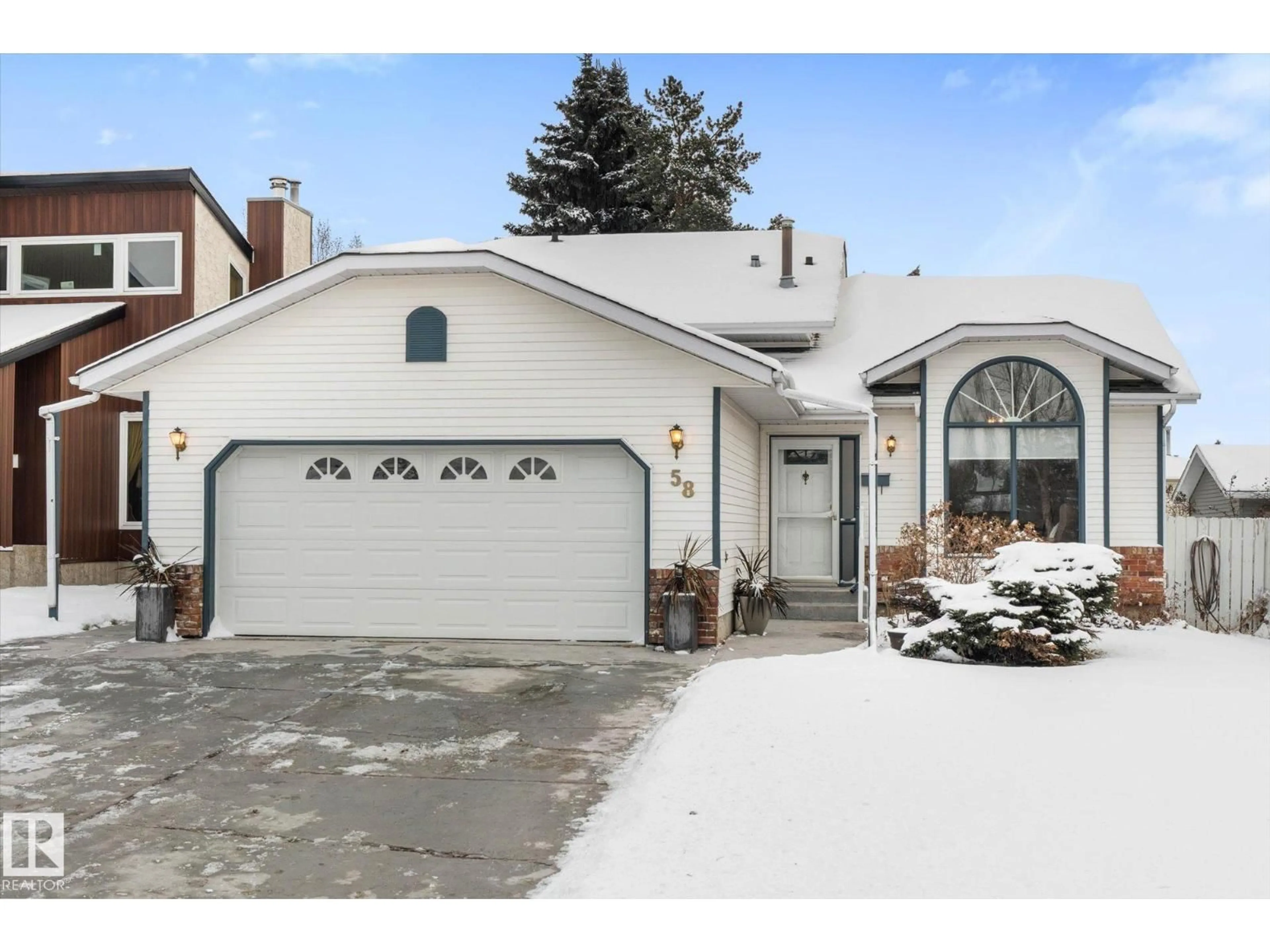 Home with vinyl exterior material, street for 58 MCKEAN WY, Spruce Grove Alberta T7X2S1