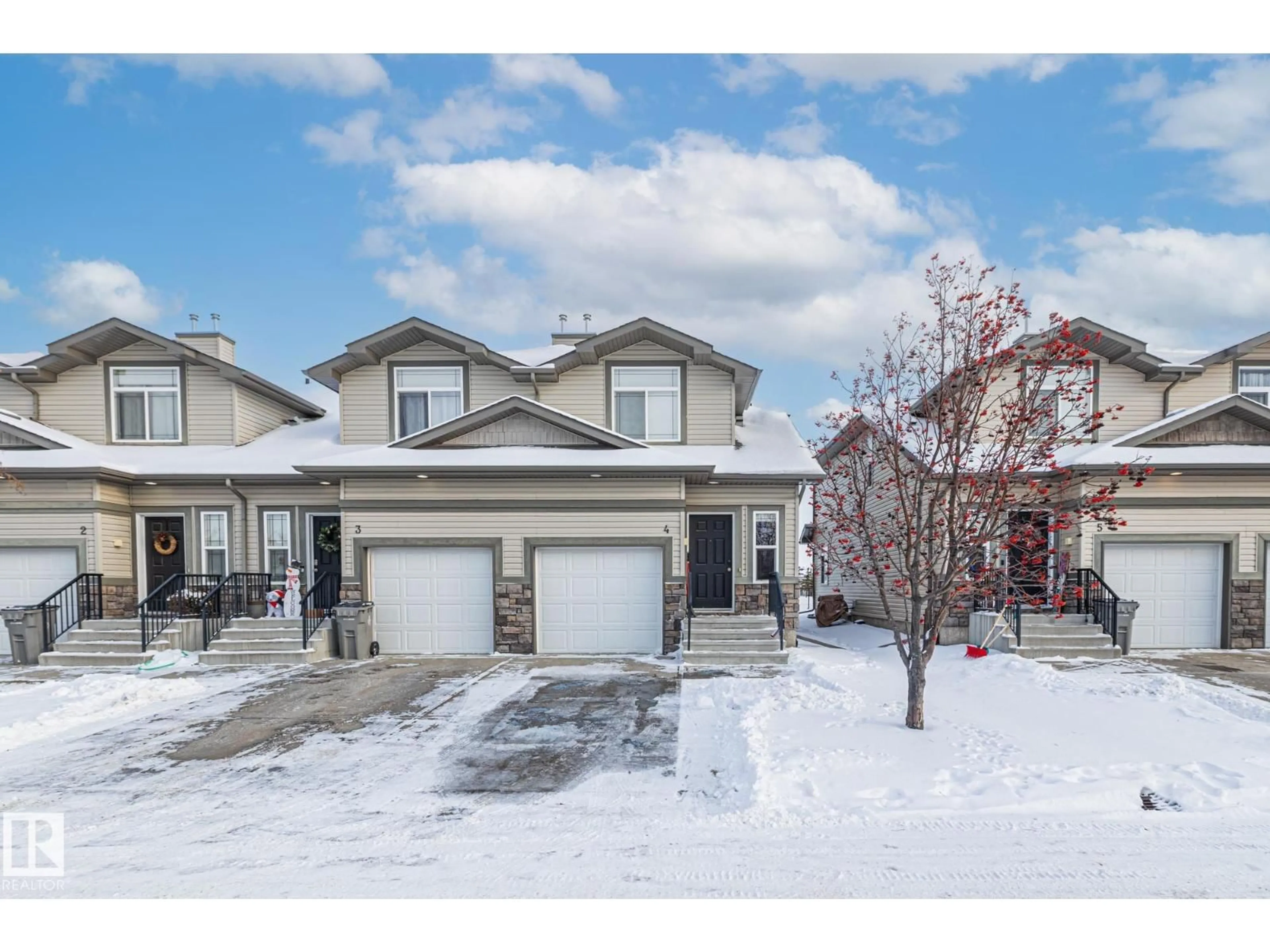 A pic from outside/outdoor area/front of a property/back of a property/a pic from drone, street for #4 - 9511 102 AV, Morinville Alberta T8R0C6