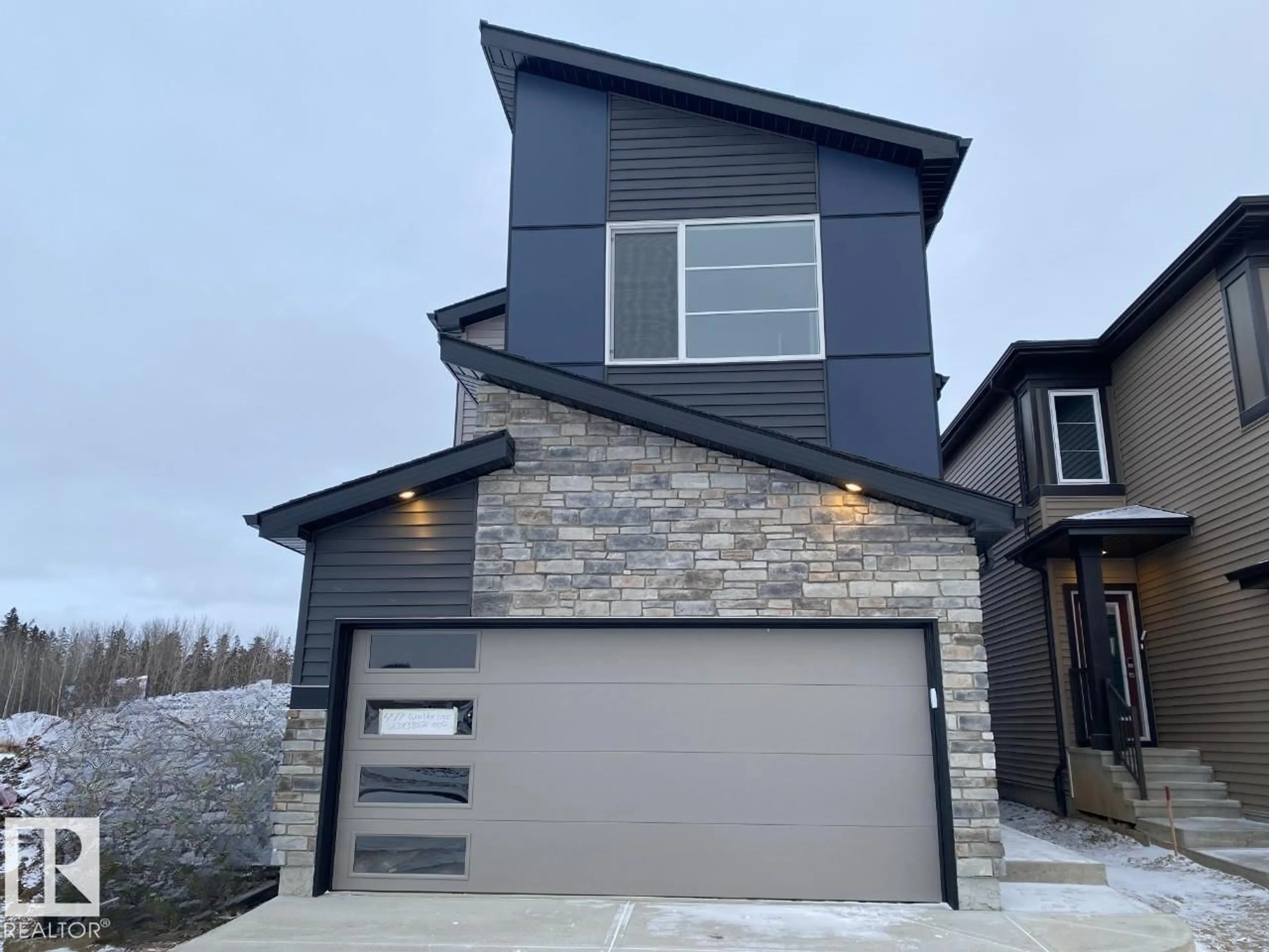 Home with brick exterior material, street for 4519 WARBLER LO, Edmonton Alberta T5S0S7