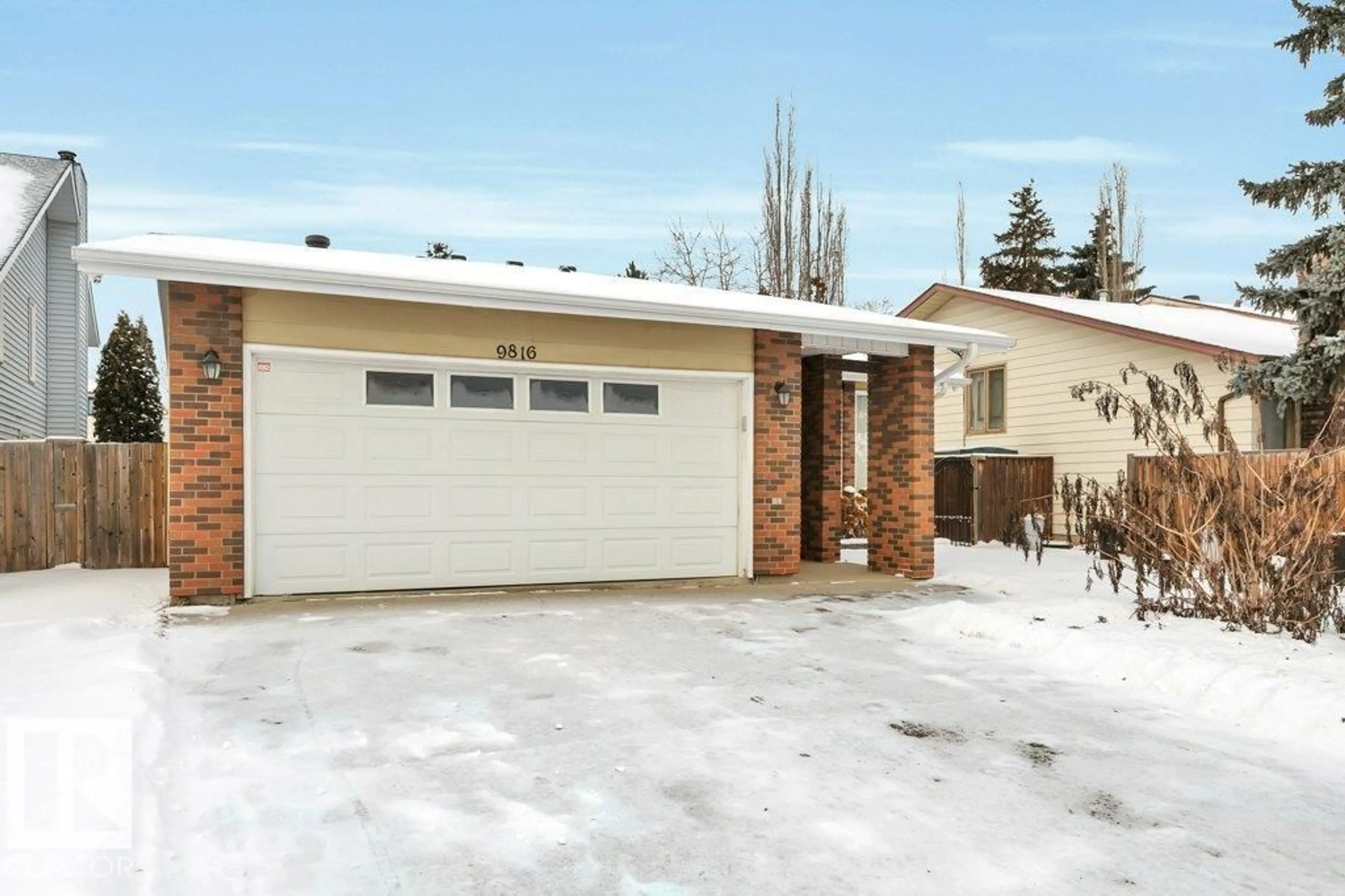 Home with brick exterior material, street for NW - 9816 181 ST, Edmonton Alberta T5T3H9