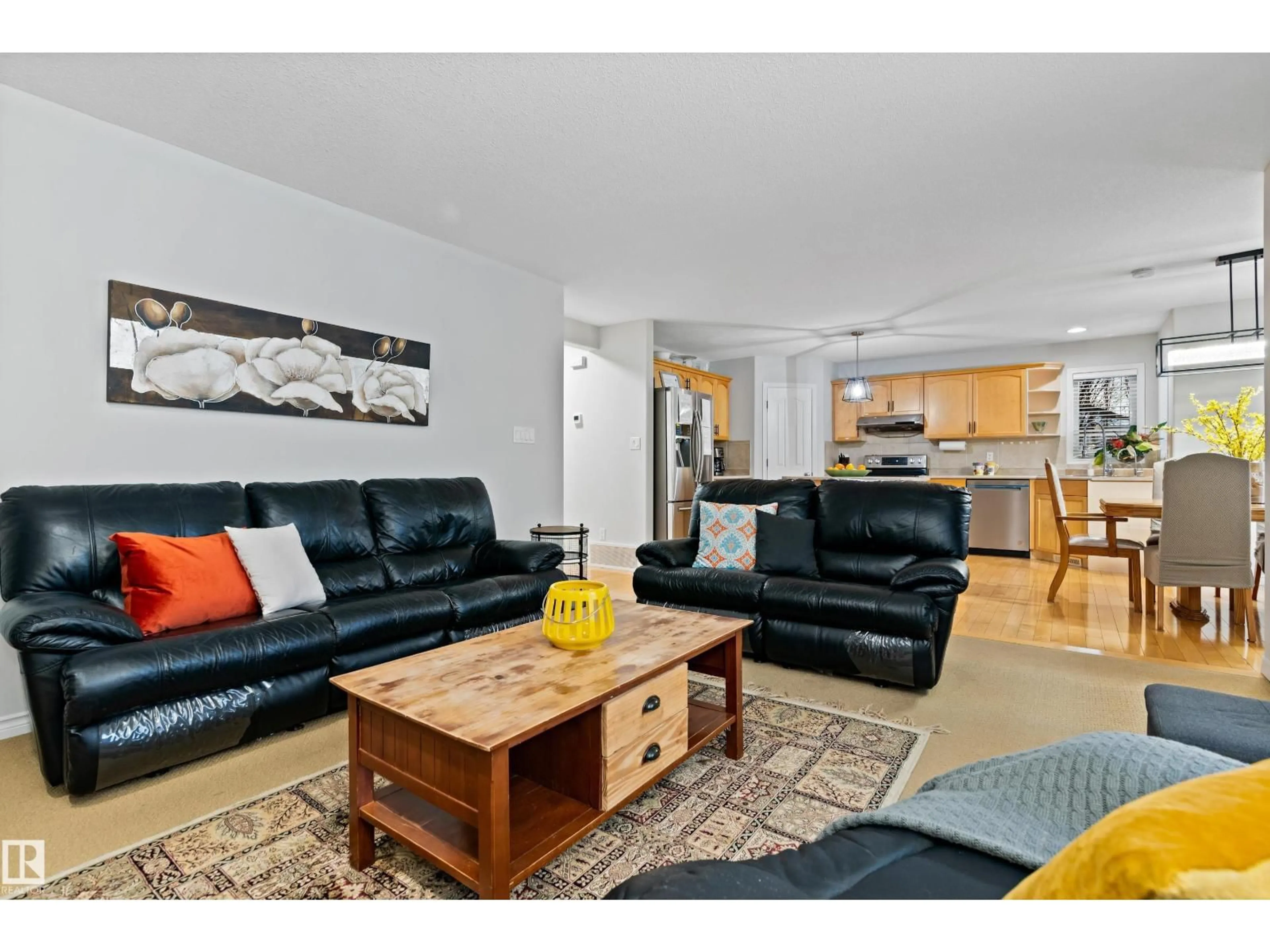 Living room with furniture, wood/laminate floor for 20432 50 AV, Edmonton Alberta T6M2Z8