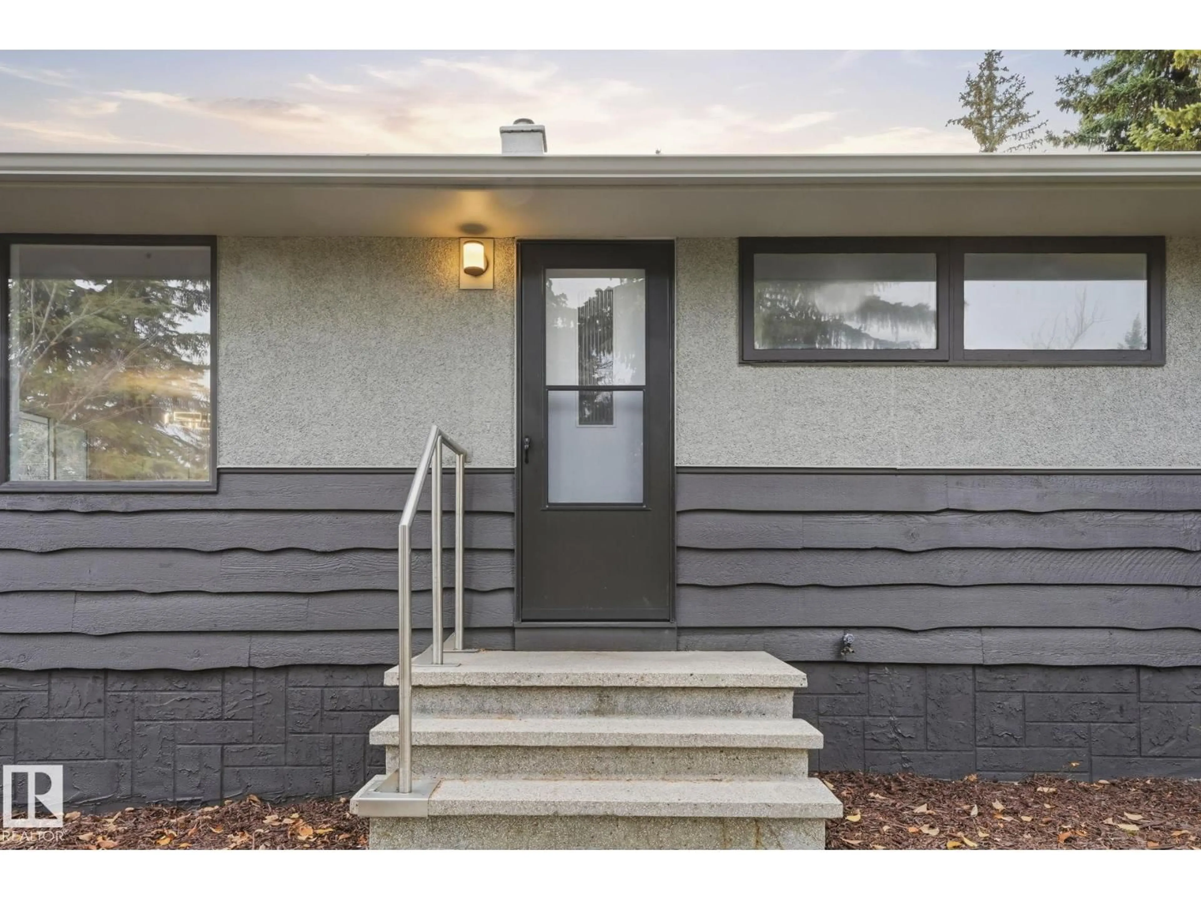 Home with vinyl exterior material, street for 14719 87 AV, Edmonton Alberta T5R4E5