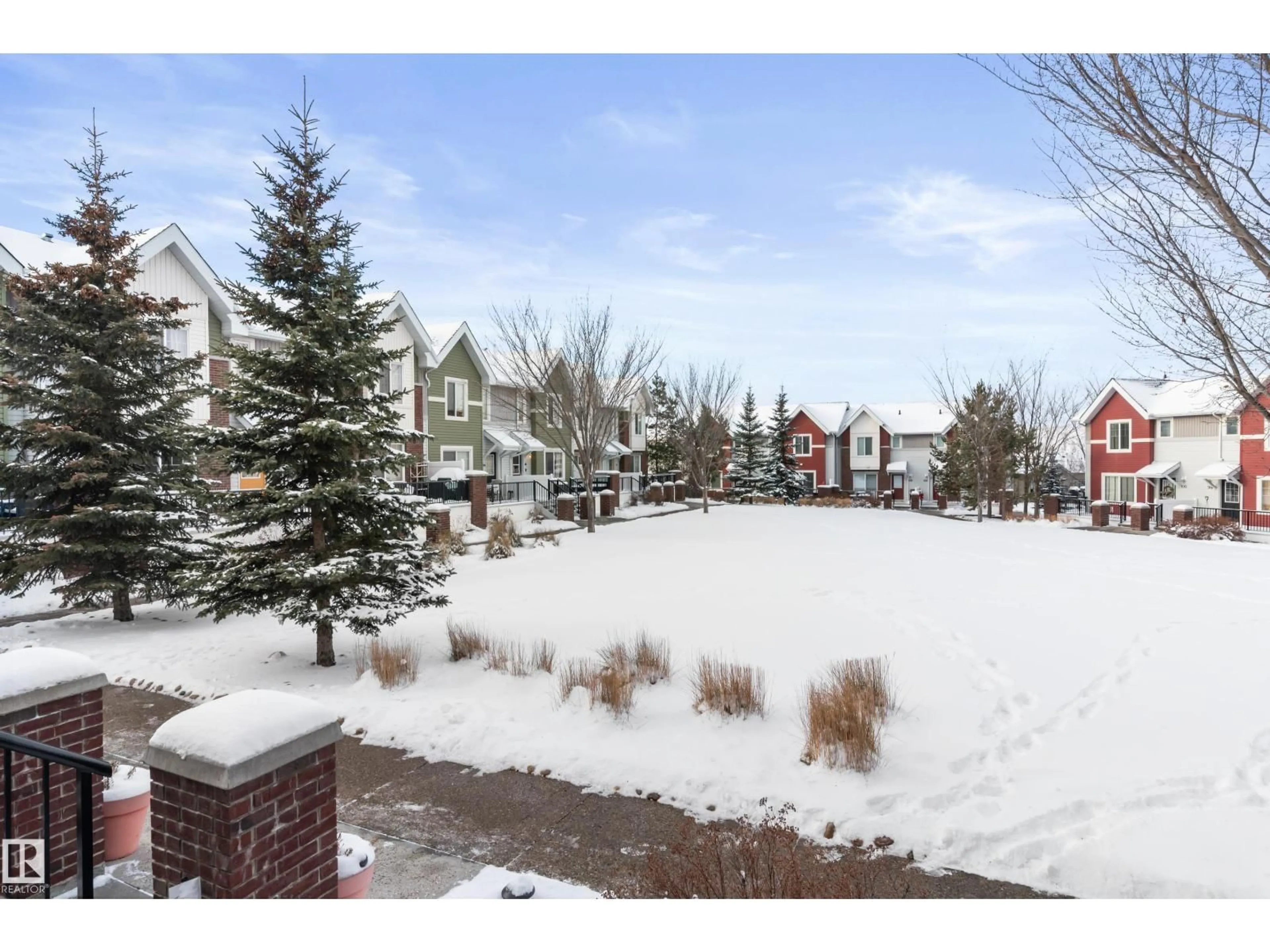A pic from outside/outdoor area/front of a property/back of a property/a pic from drone, mountain view for 64 2336 ASPEN TR, Sherwood Park Alberta T8H1J1