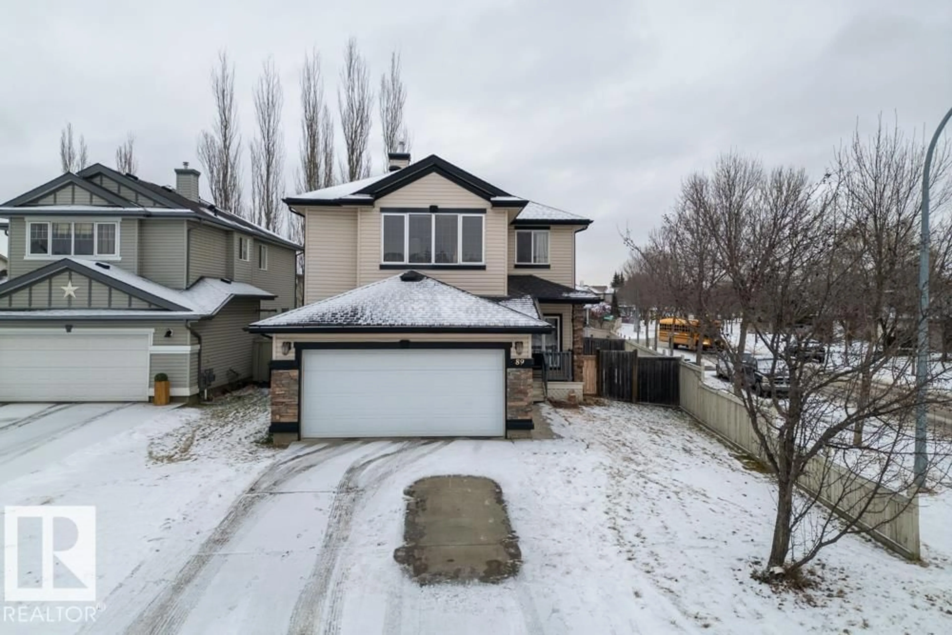 A pic from outside/outdoor area/front of a property/back of a property/a pic from drone, street for 89 ERIN RIDGE DR, St. Albert Alberta T8N2B8