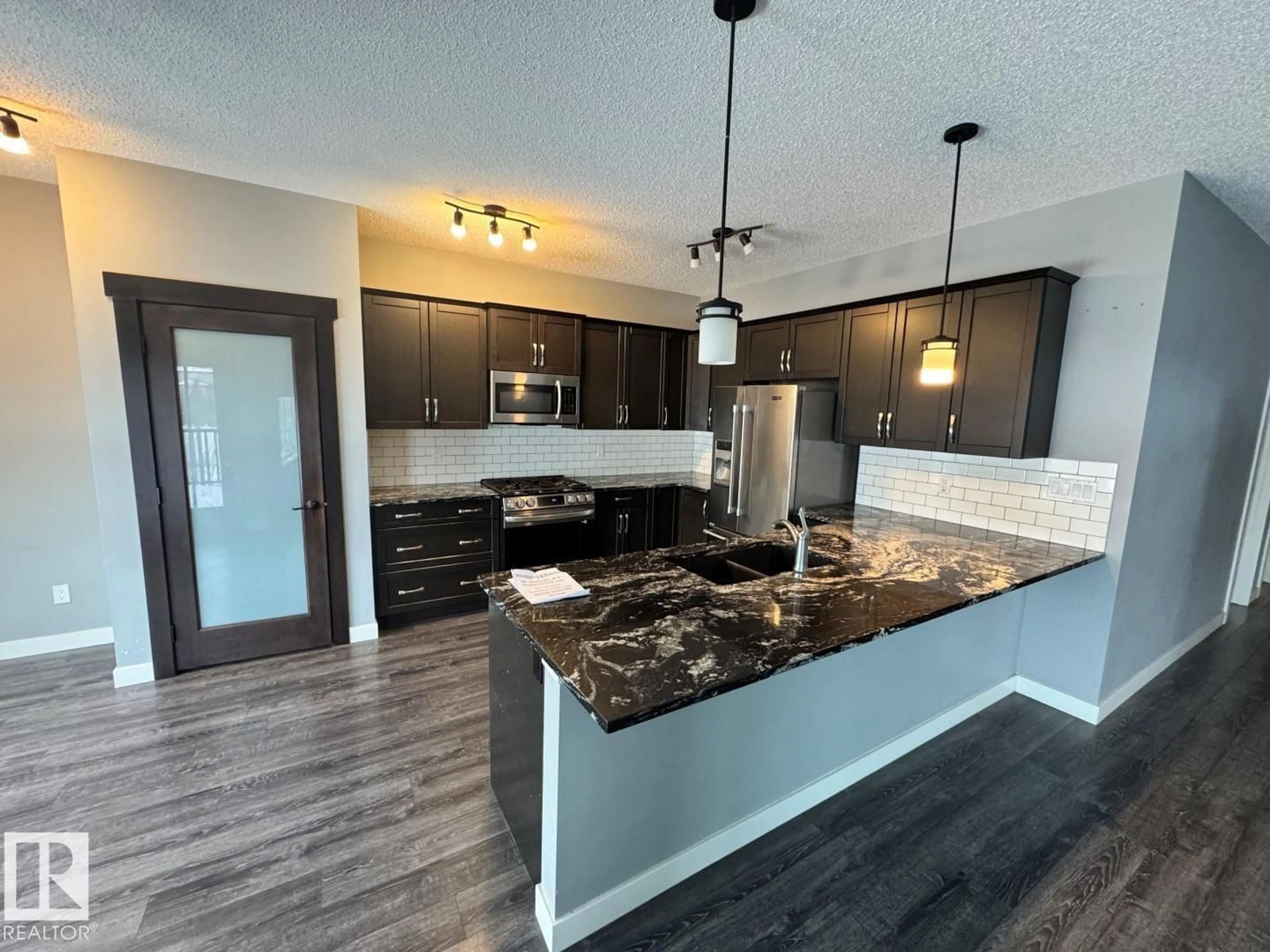 Open concept kitchen, unknown for 1352 SECORD LANDING LD, Edmonton Alberta T5T5W7