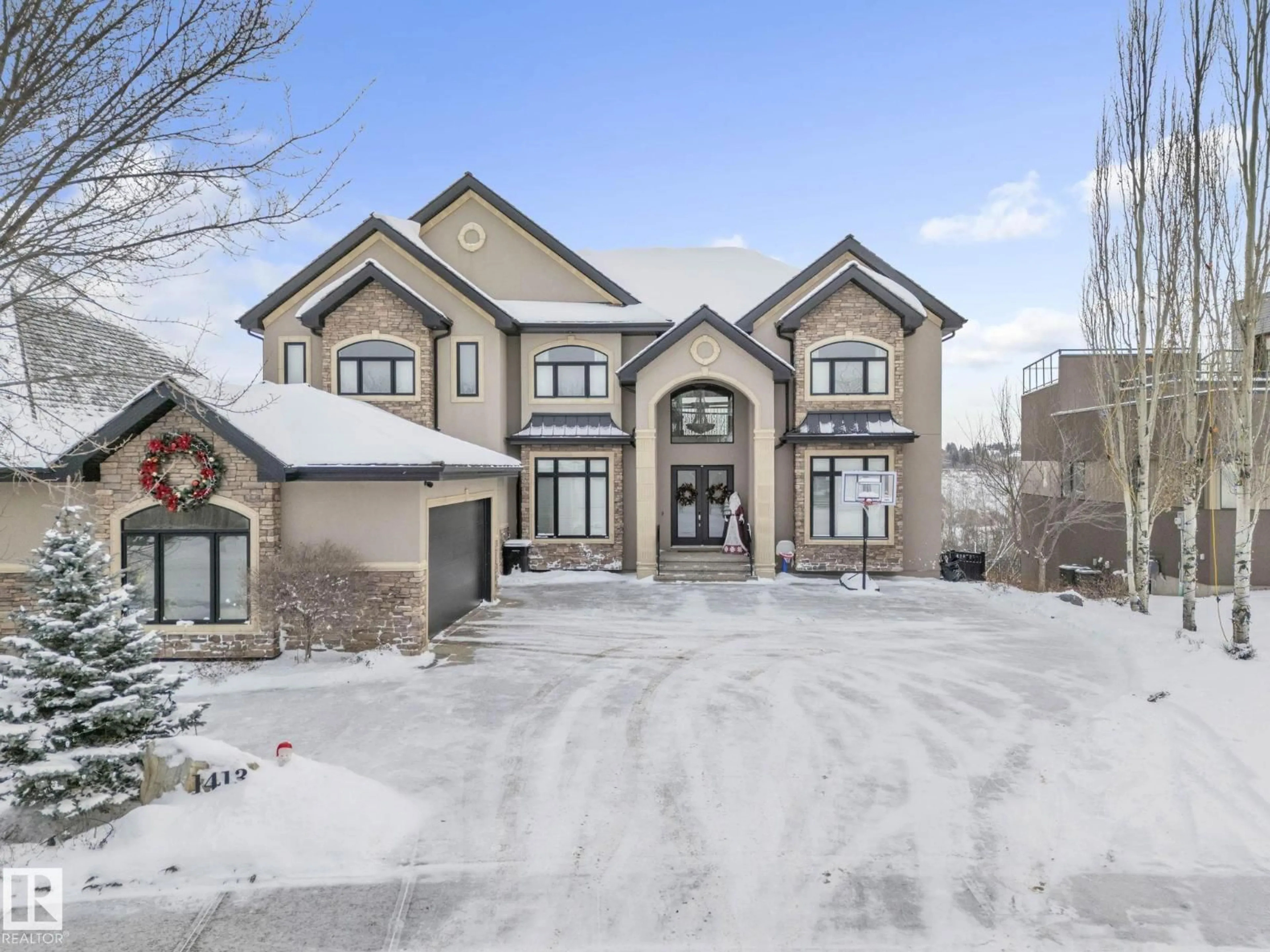 Home with brick exterior material, street for 1413 WOODWARD CR, Edmonton Alberta T6M0A3