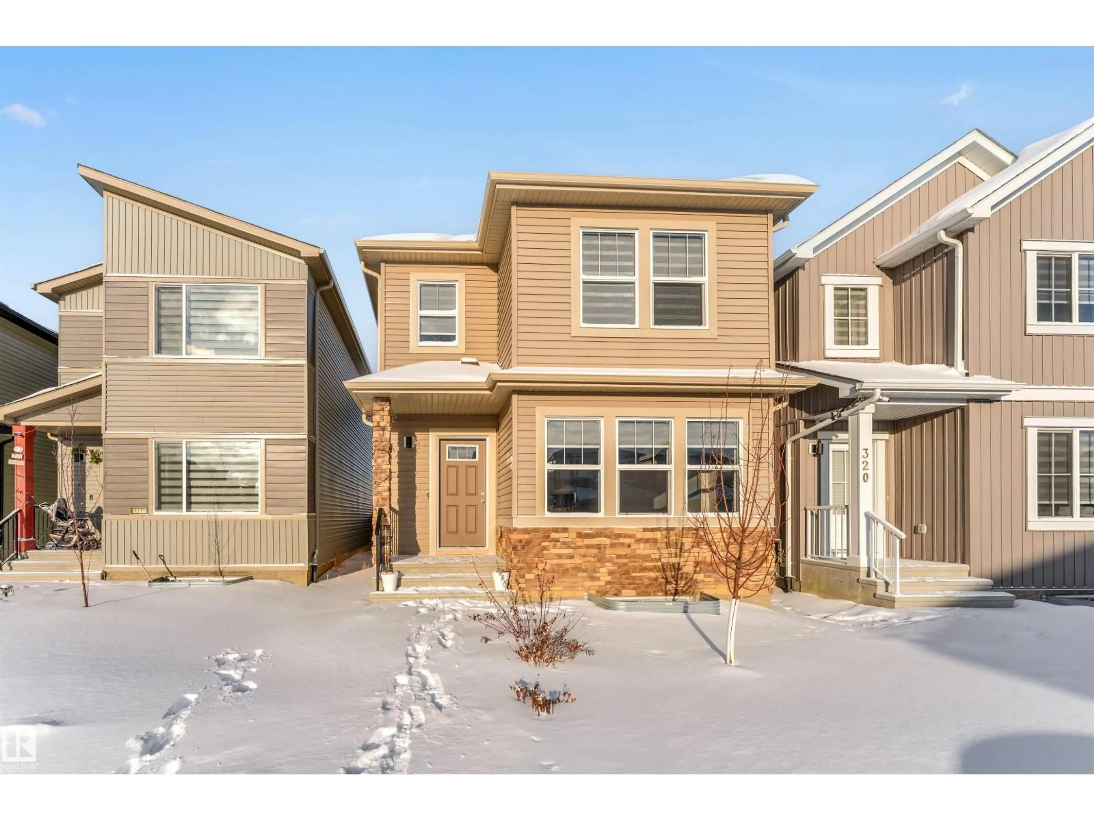 Home with brick exterior material, street for 324 36 AV, Edmonton Alberta T6T2P9