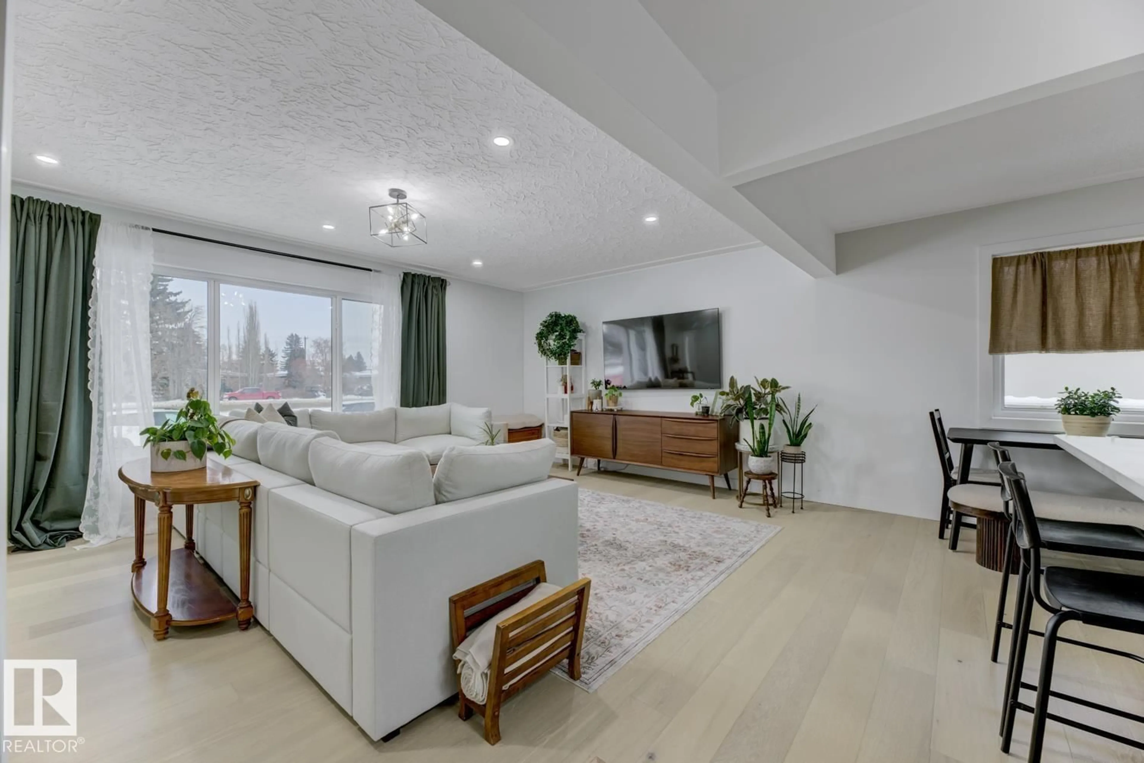 Living room with furniture, unknown for NW - 6823 98 AV, Edmonton Alberta T6A0A6