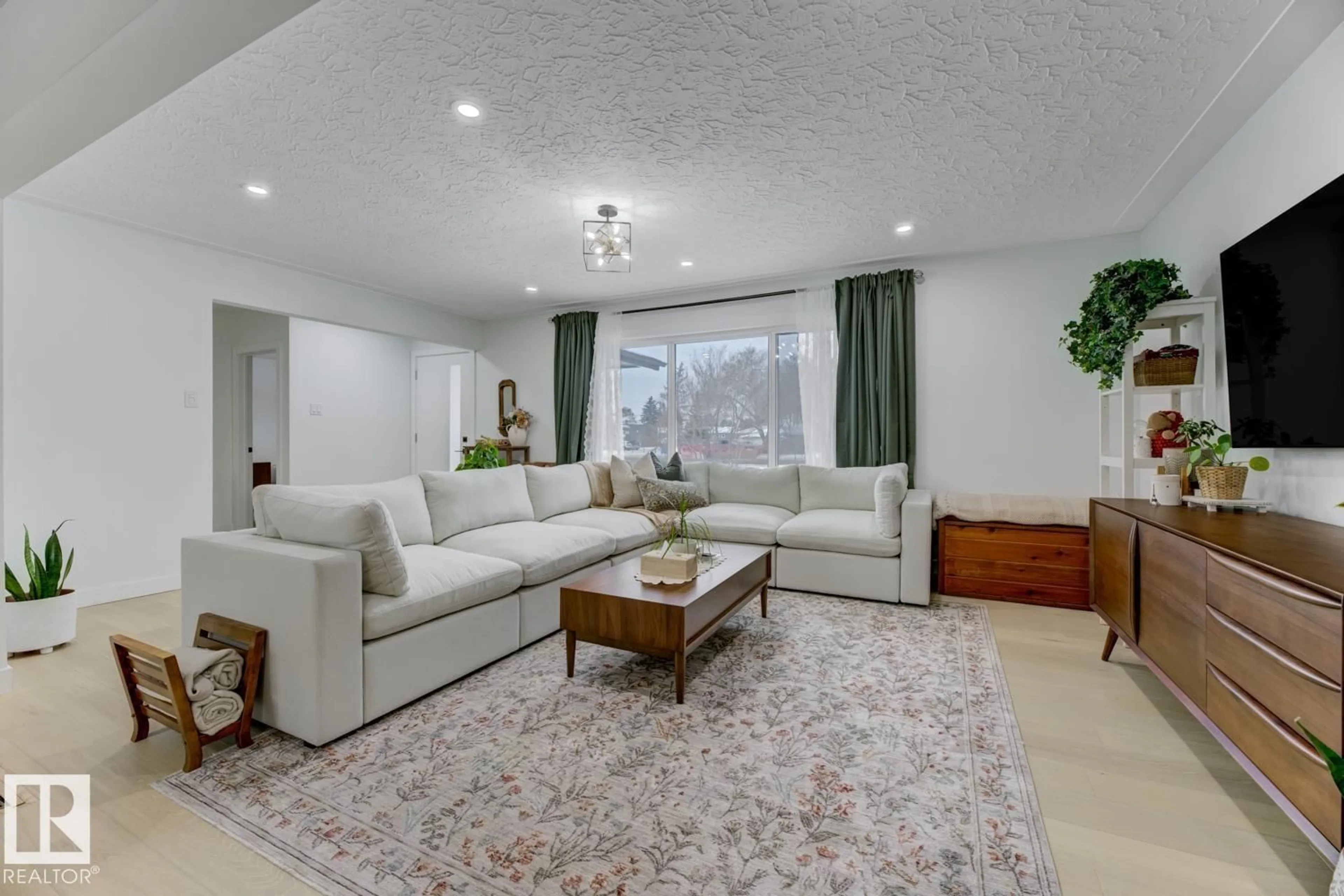 Living room with furniture, unknown for NW - 6823 98 AV, Edmonton Alberta T6A0A6