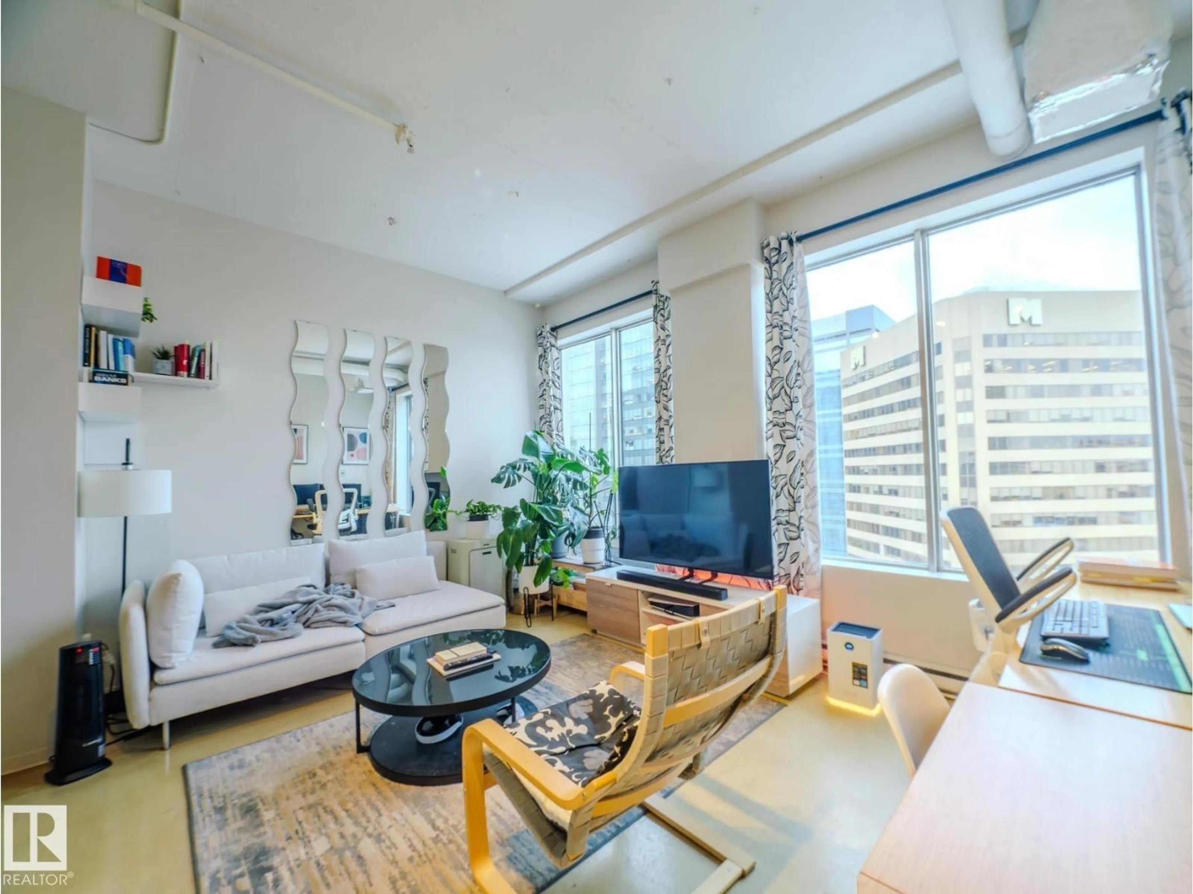 Living room with furniture, unknown for 10024 - 1603 JASPER AV, Edmonton Alberta T5J1R9