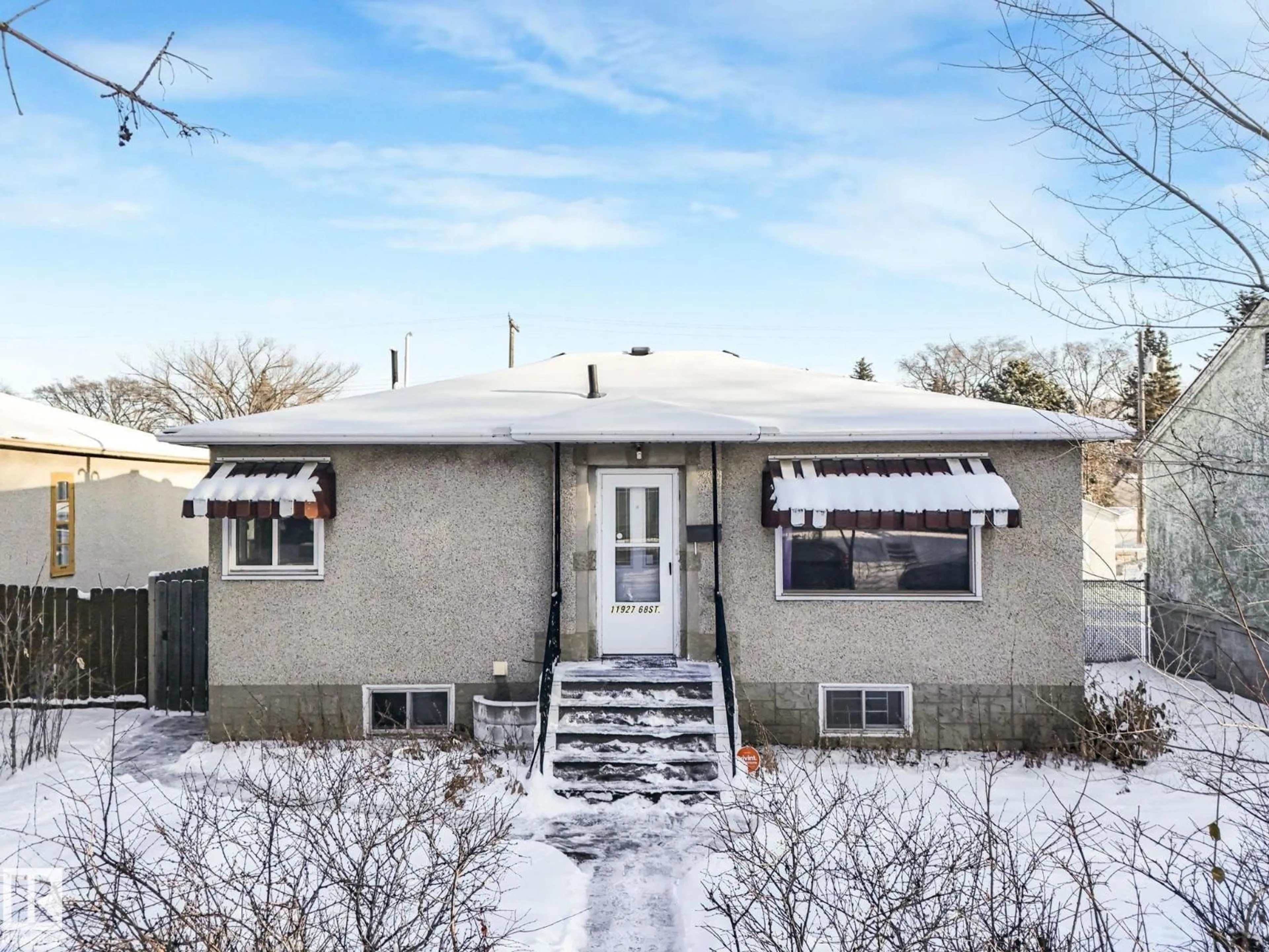 Home with vinyl exterior material, street for NW - 11927 68 ST, Edmonton Alberta T5B1P8