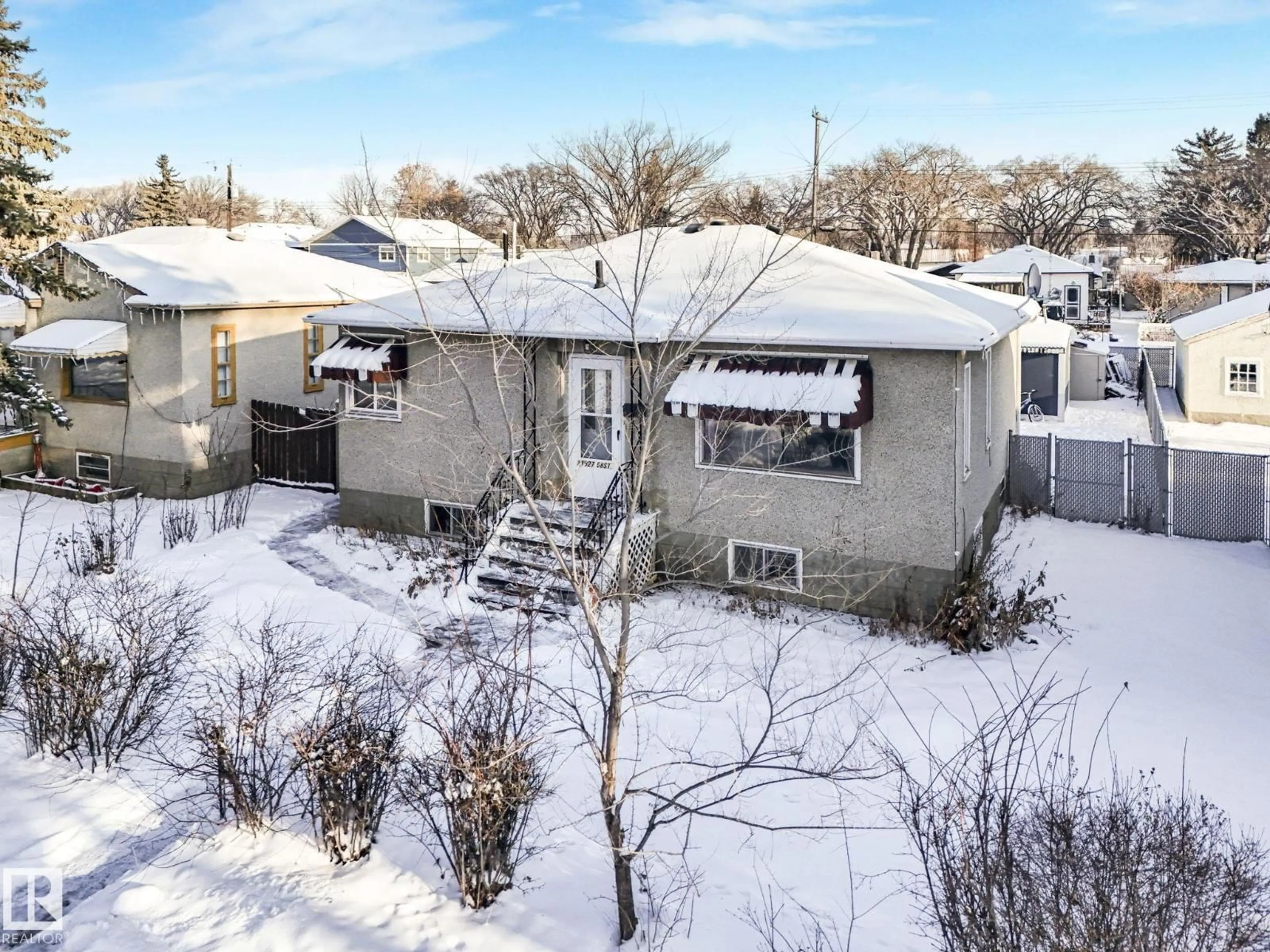 A pic from outside/outdoor area/front of a property/back of a property/a pic from drone, street for NW - 11927 68 ST, Edmonton Alberta T5B1P8
