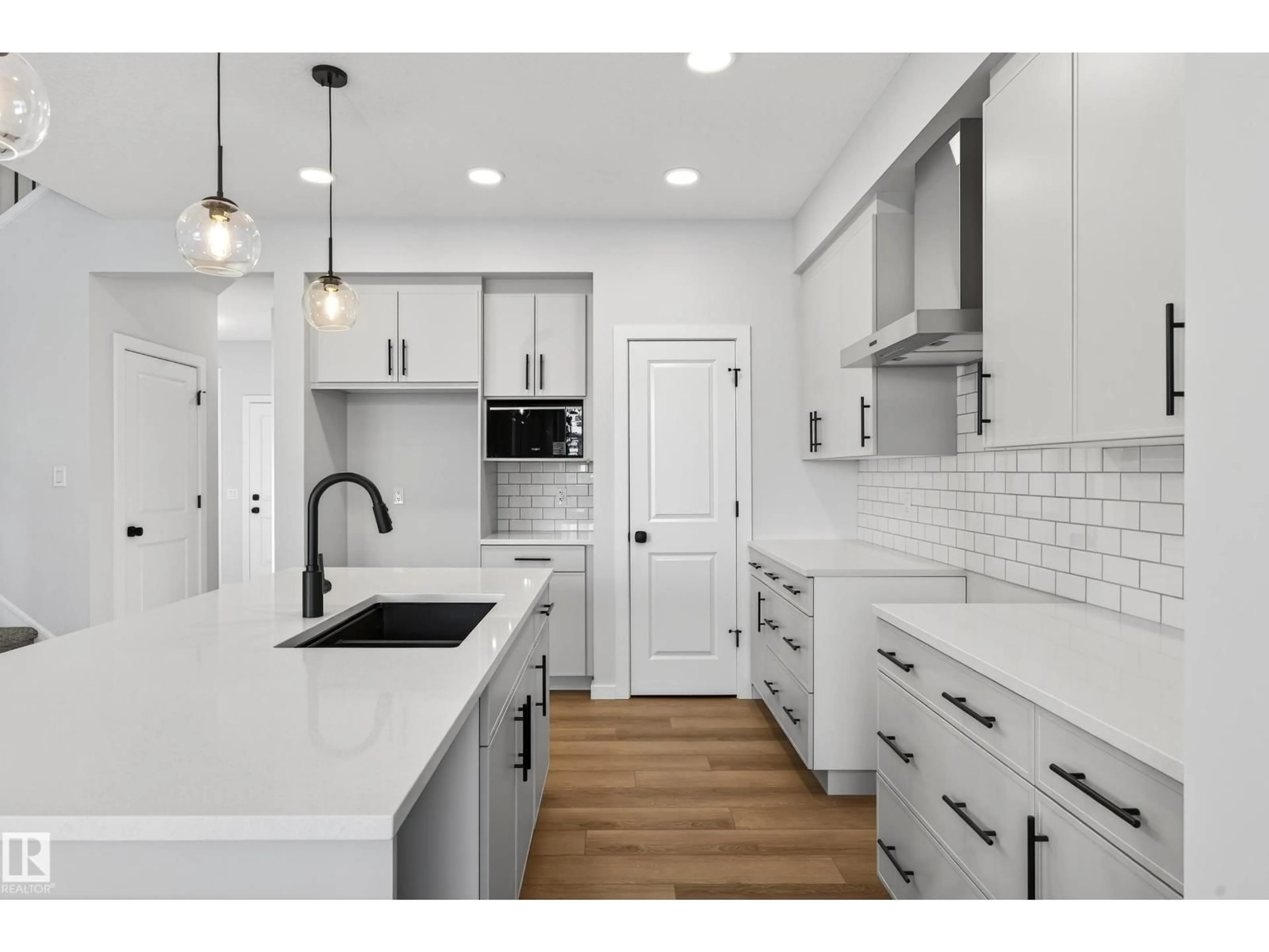 Open concept kitchen, ceramic/tile floor for 2251 194 ST, Edmonton Alberta T6M3B7