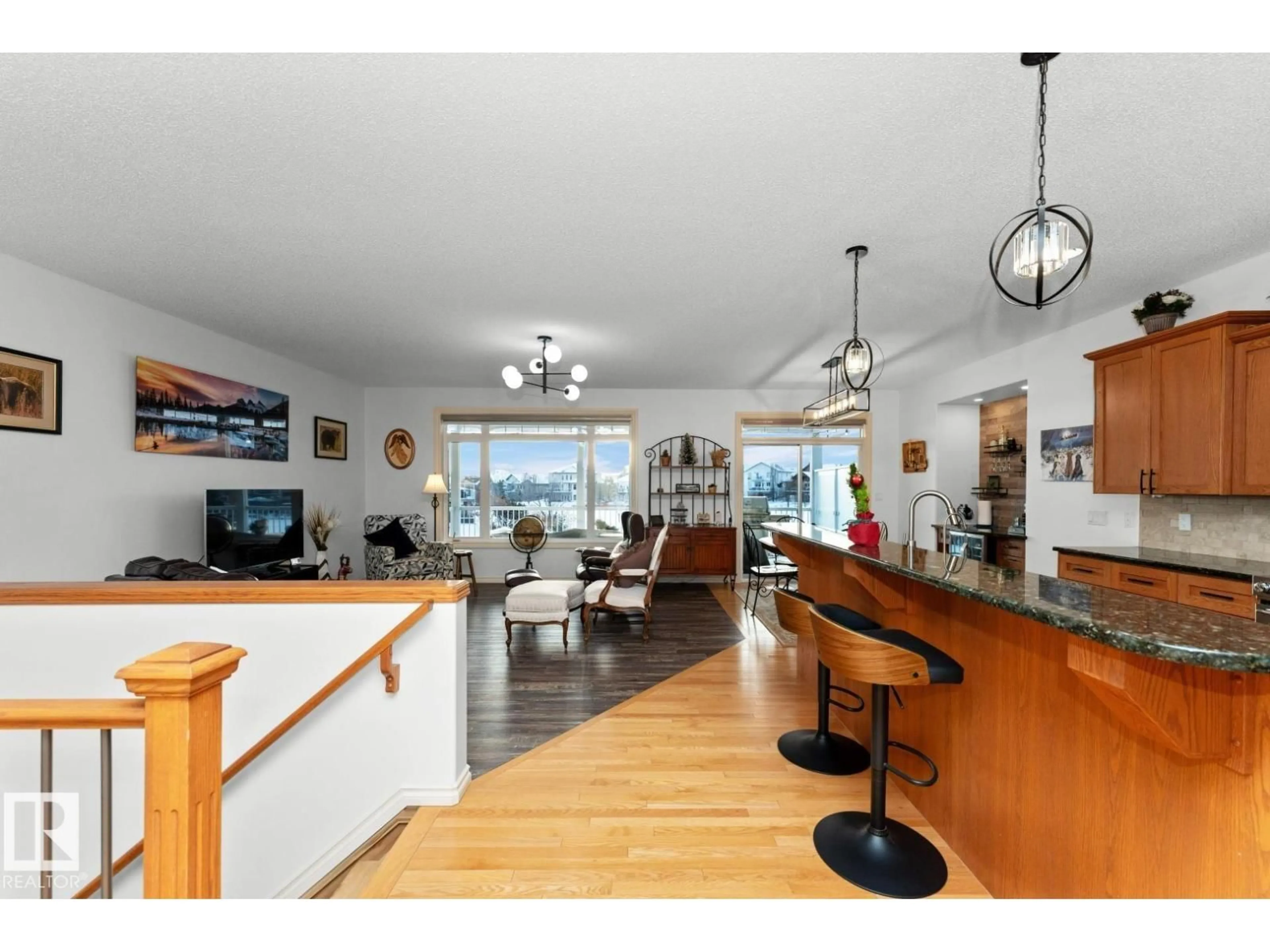 Open concept kitchen, wood/laminate floor for 3211 62, Beaumont Alberta T4X1T6