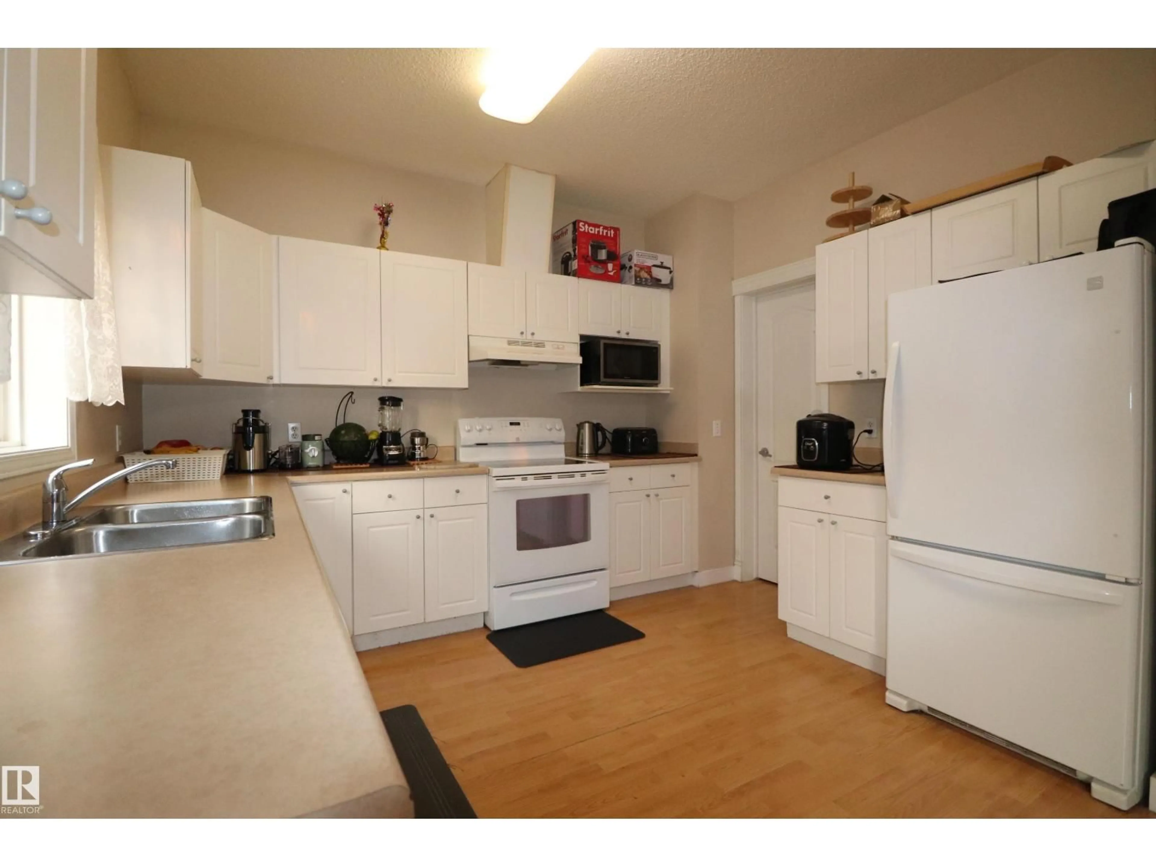Standard kitchen, unknown for #47 - 16728 115 ST NW, Edmonton Alberta T5X6G6