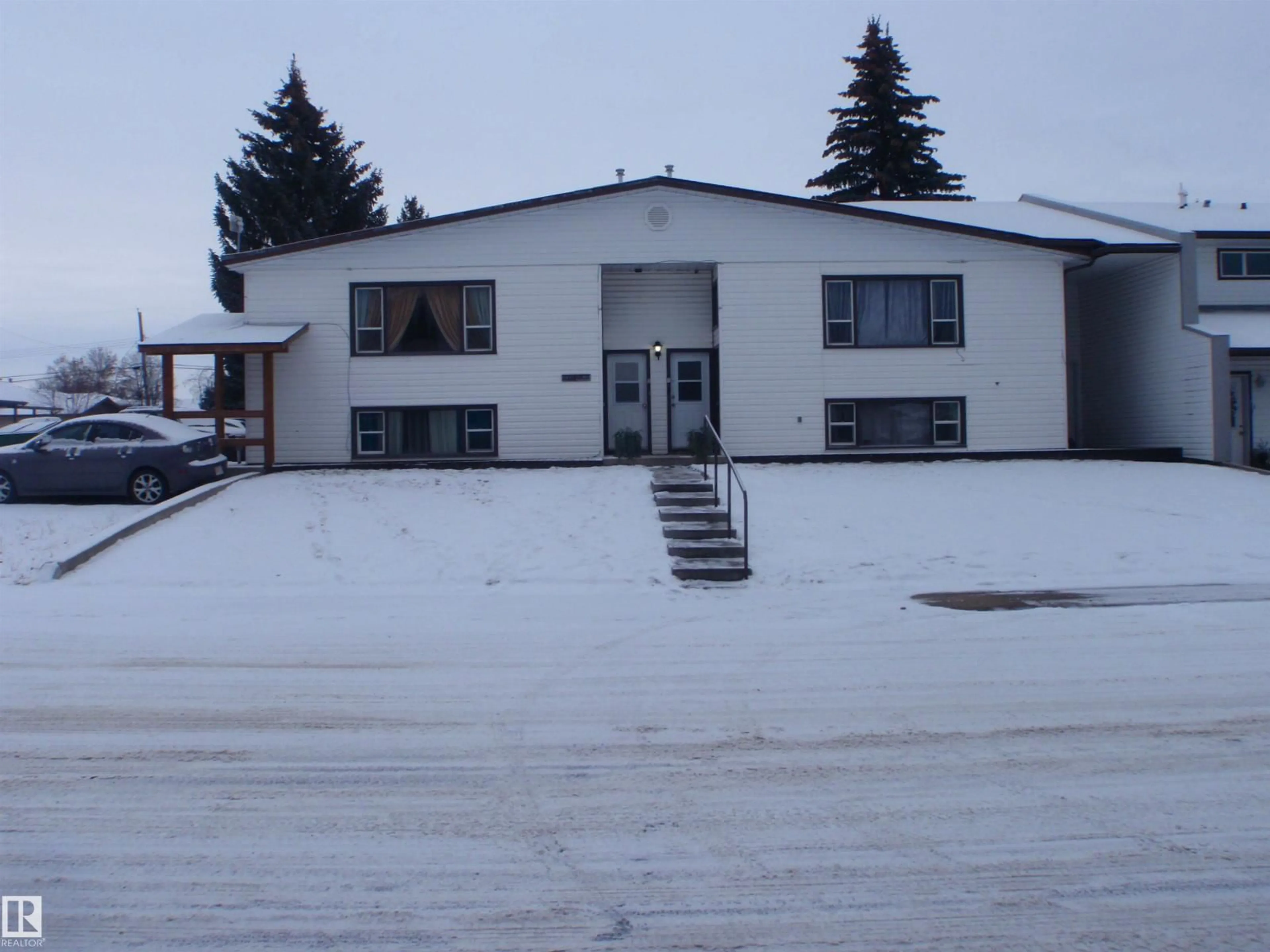 A pic from outside/outdoor area/front of a property/back of a property/a pic from drone, building for 5129 46 ST, Barrhead Alberta T7N1H8