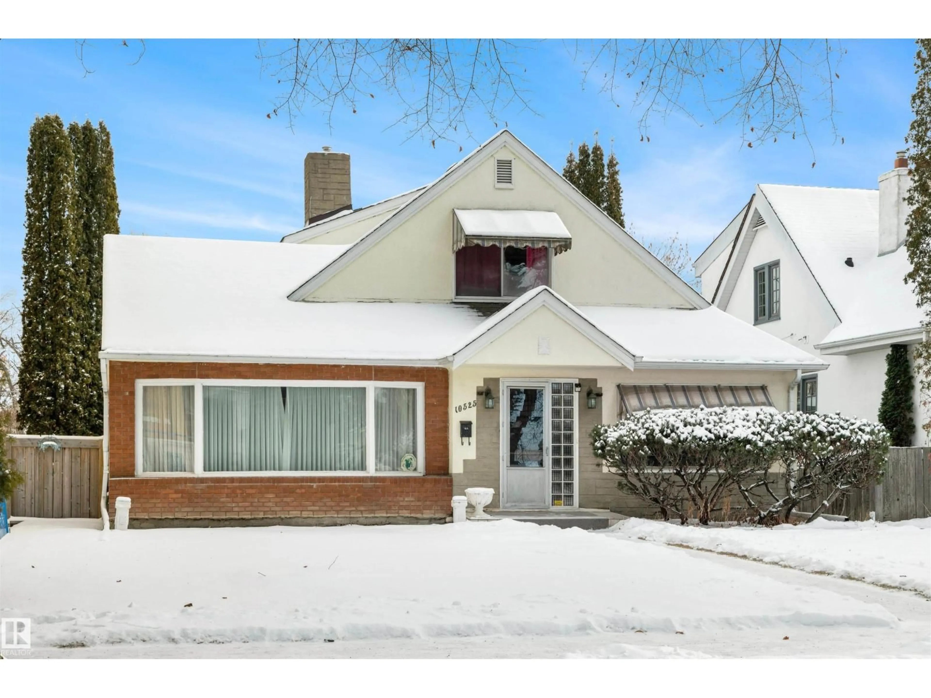 Home with brick exterior material, street for NW - 10525 134 ST, Edmonton Alberta T5N2B4