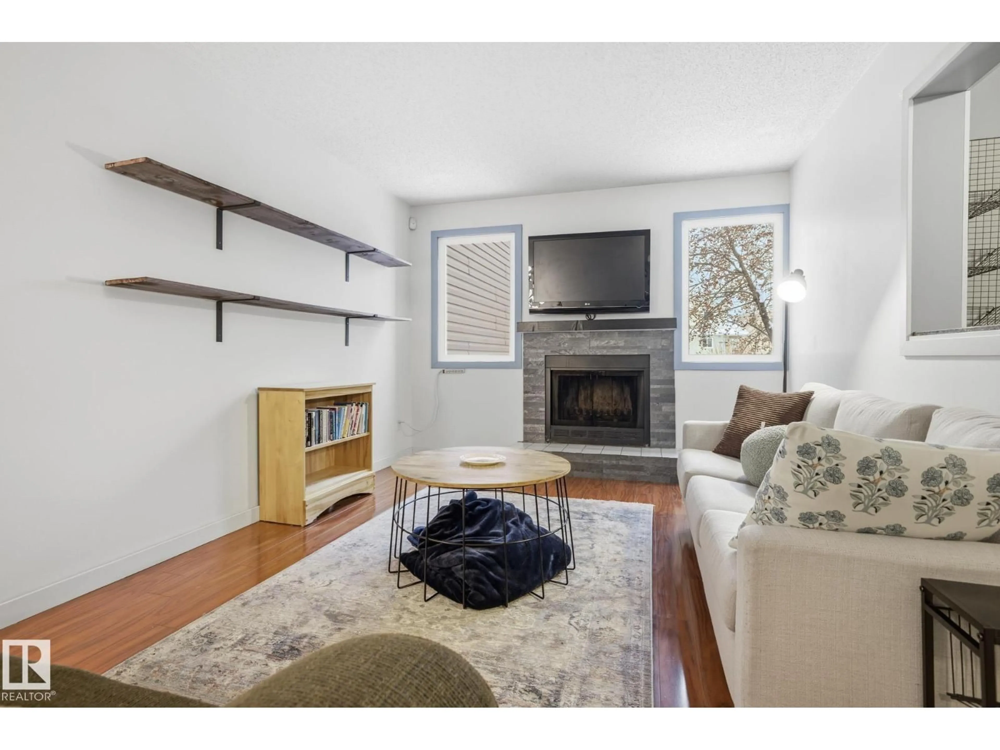 Living room with furniture, unknown for 18024 96 AV, Edmonton Alberta T5T3N2