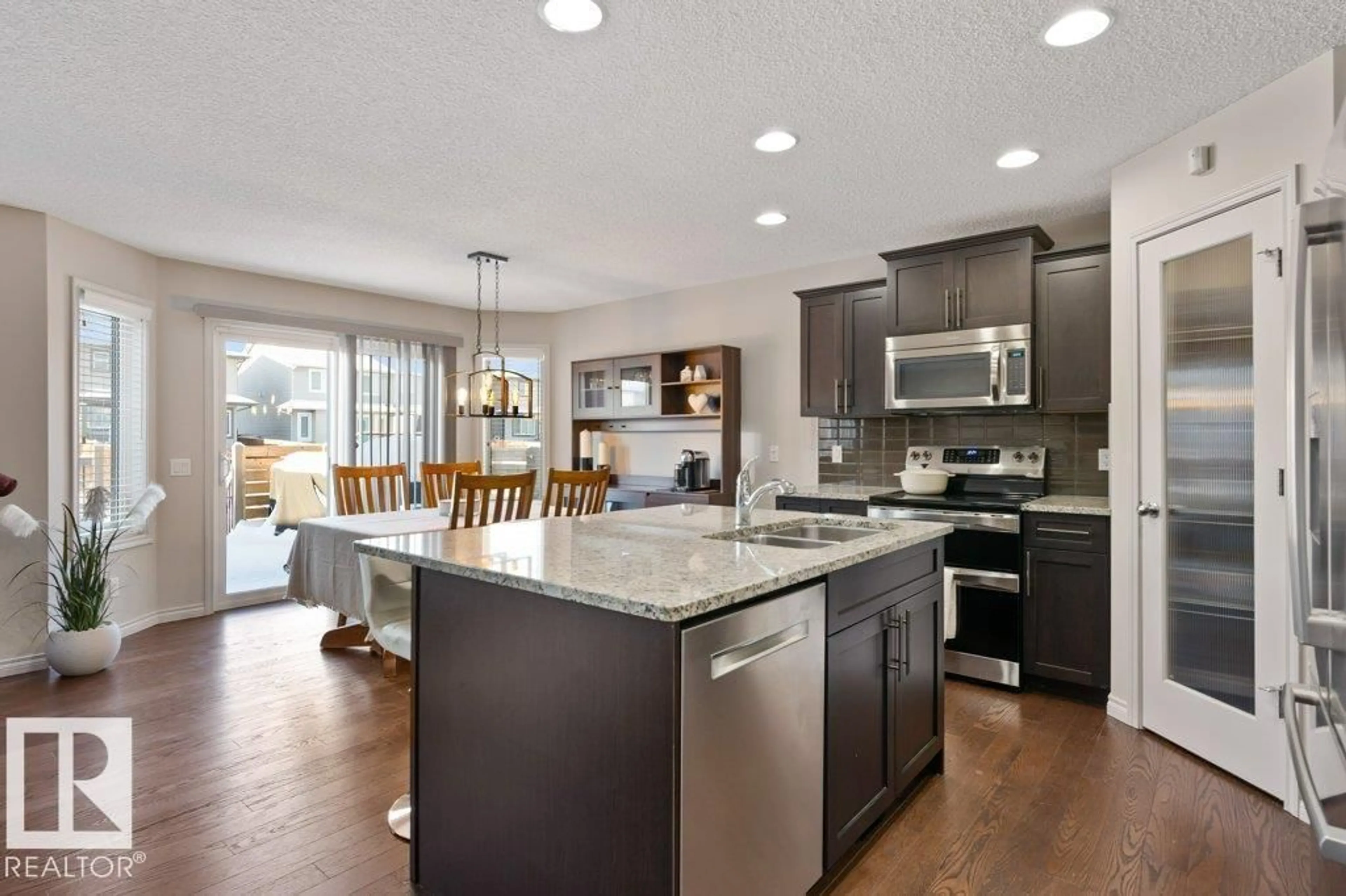 Open concept kitchen, unknown for 10612 97 ST, Morinville Alberta T8R0B8