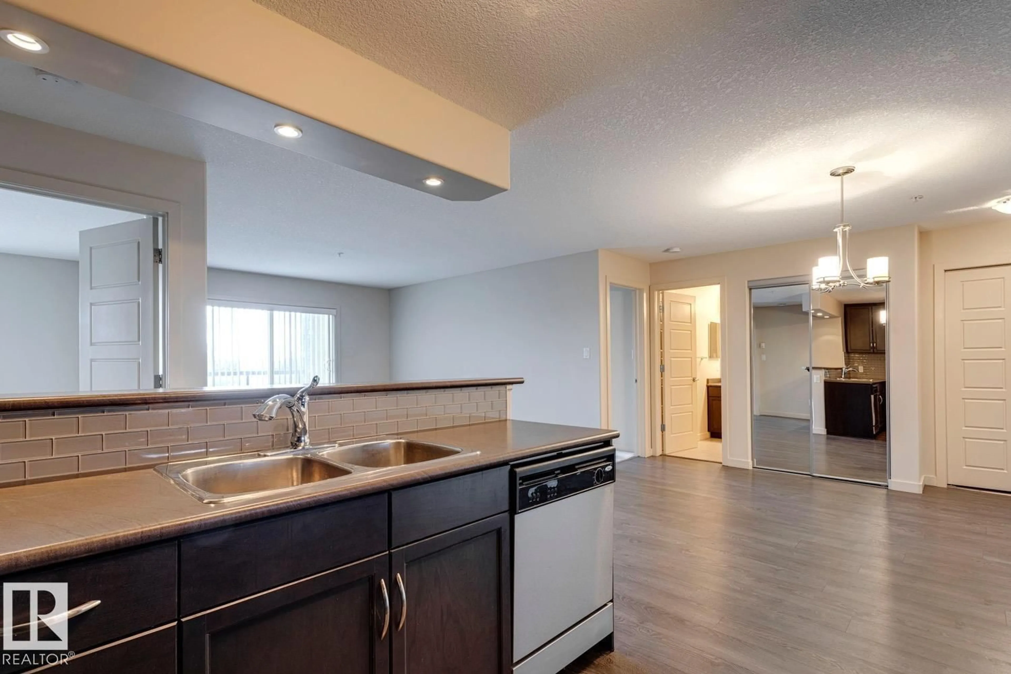 Open concept kitchen, unknown for #254 - 11517 ELLERSLIE RD, Edmonton Alberta T6W2A9