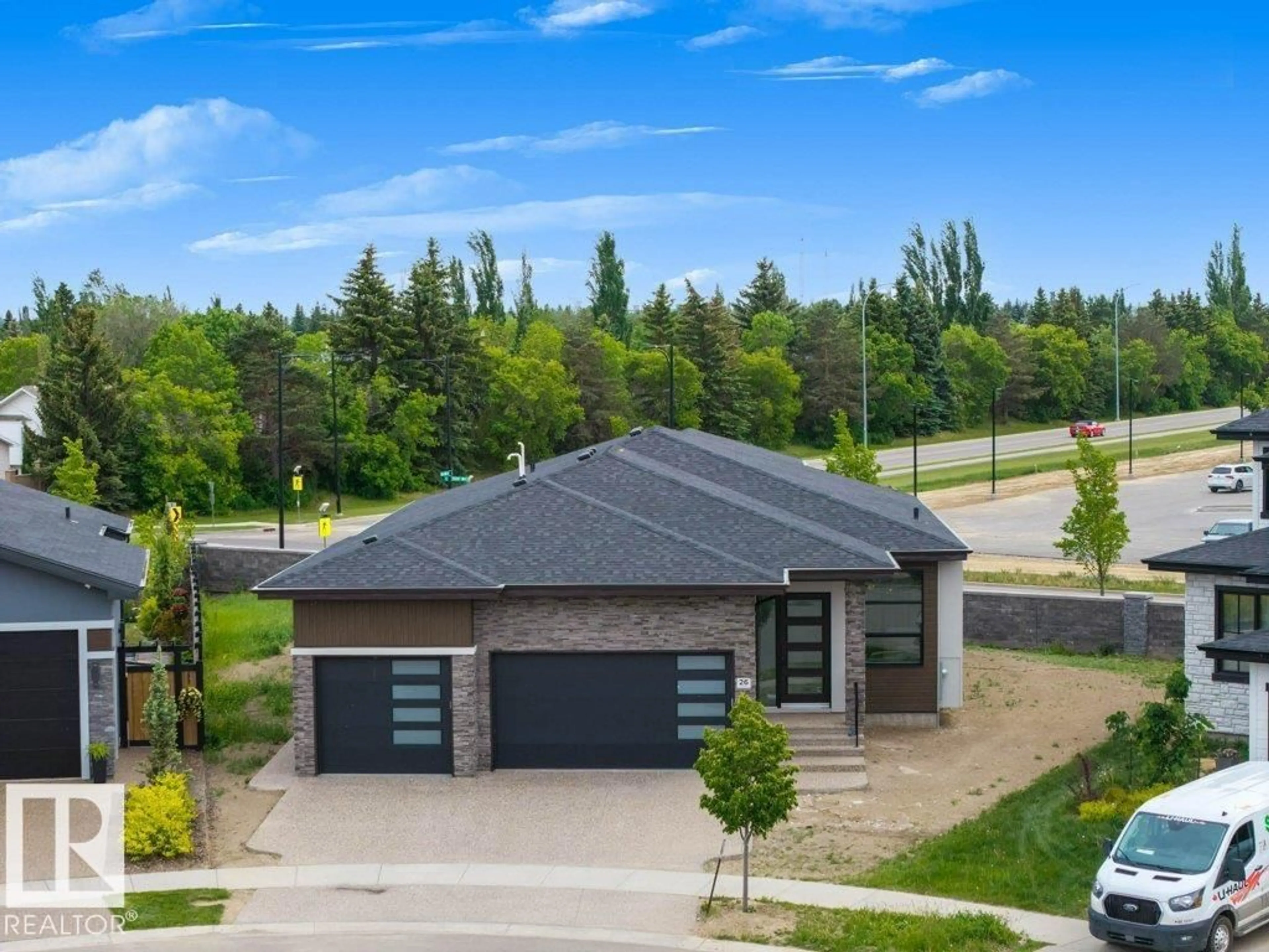 A pic from outside/outdoor area/front of a property/back of a property/a pic from drone, street for 26 EASTON CL, St. Albert Alberta T8N3X9