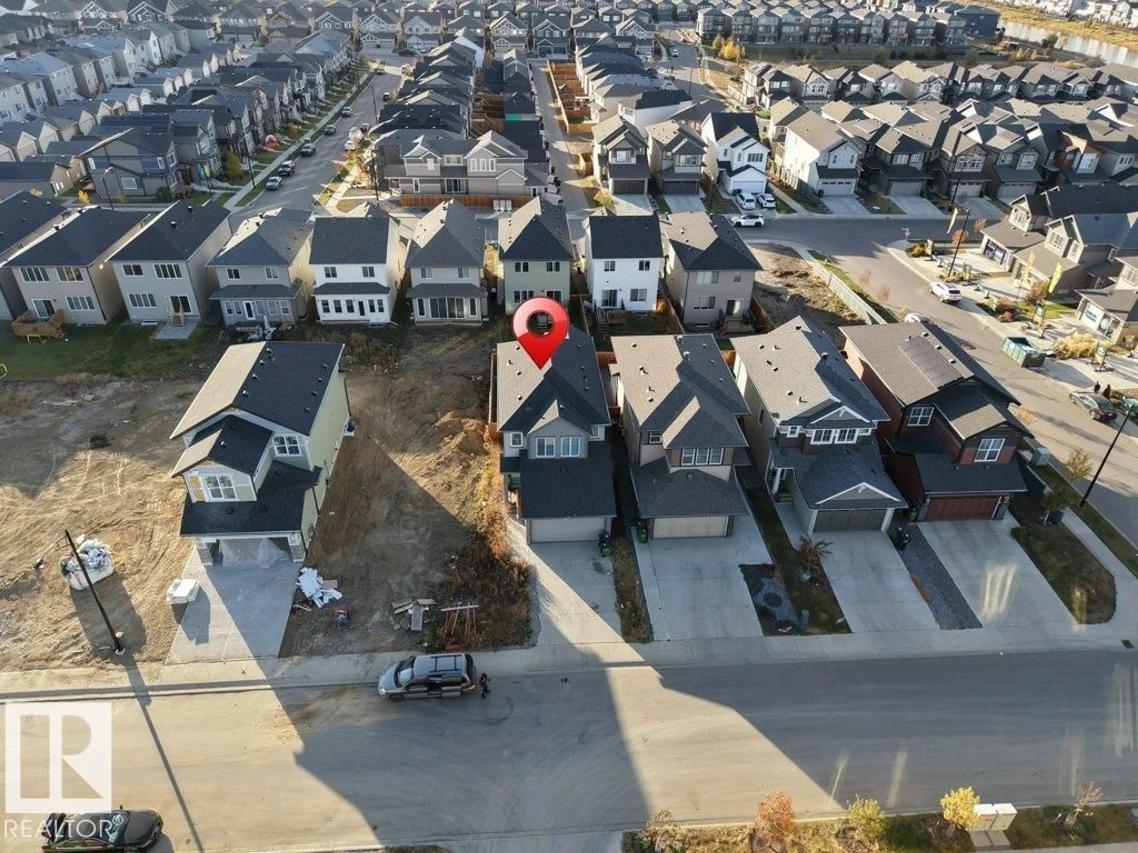 A pic from outside/outdoor area/front of a property/back of a property/a pic from drone, street for 4610 KINSELLA LANDING, Edmonton Alberta T6W4K1