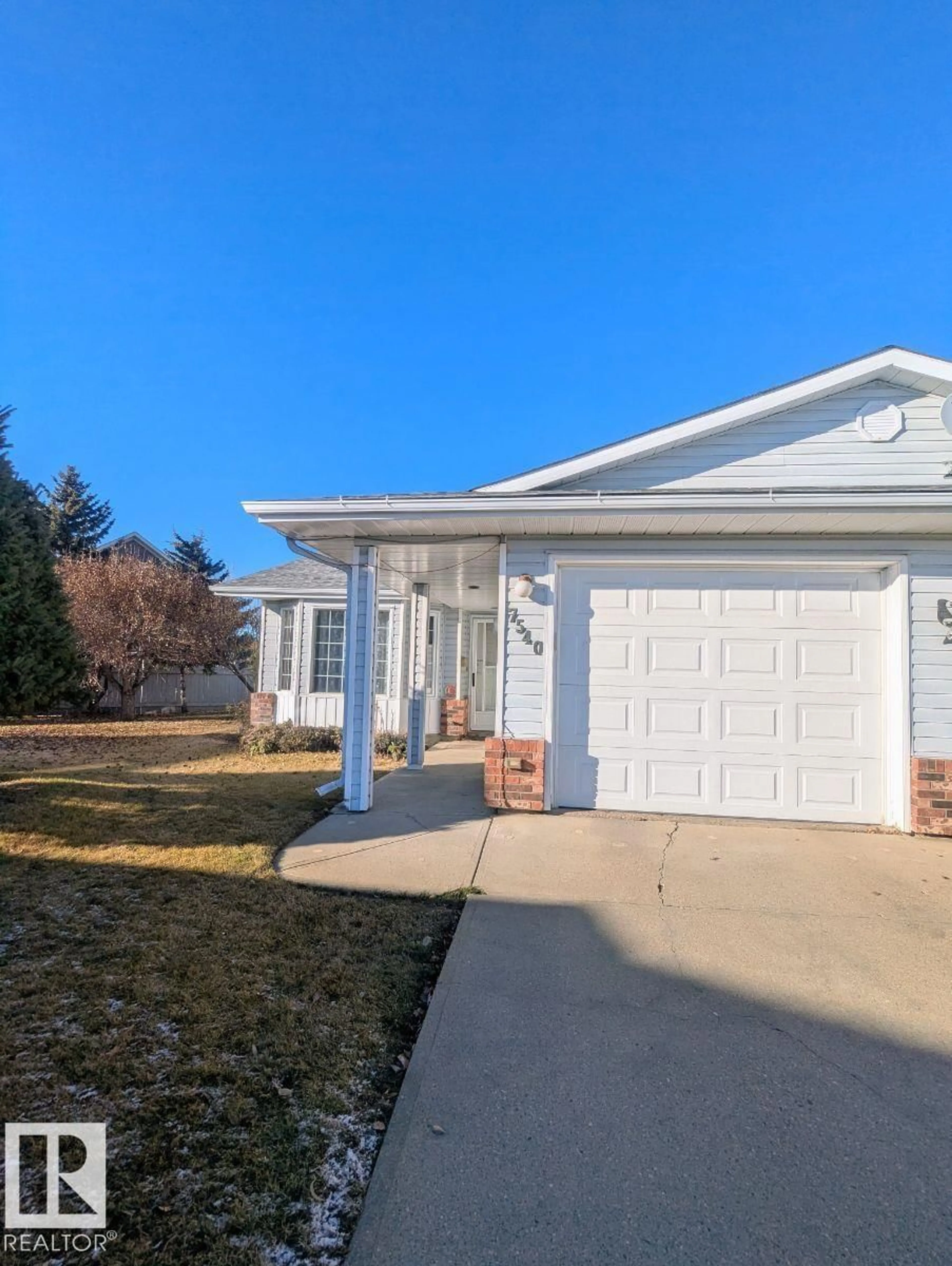 Home with vinyl exterior material, street for 7540 137A AV, Edmonton Alberta T5C3R4