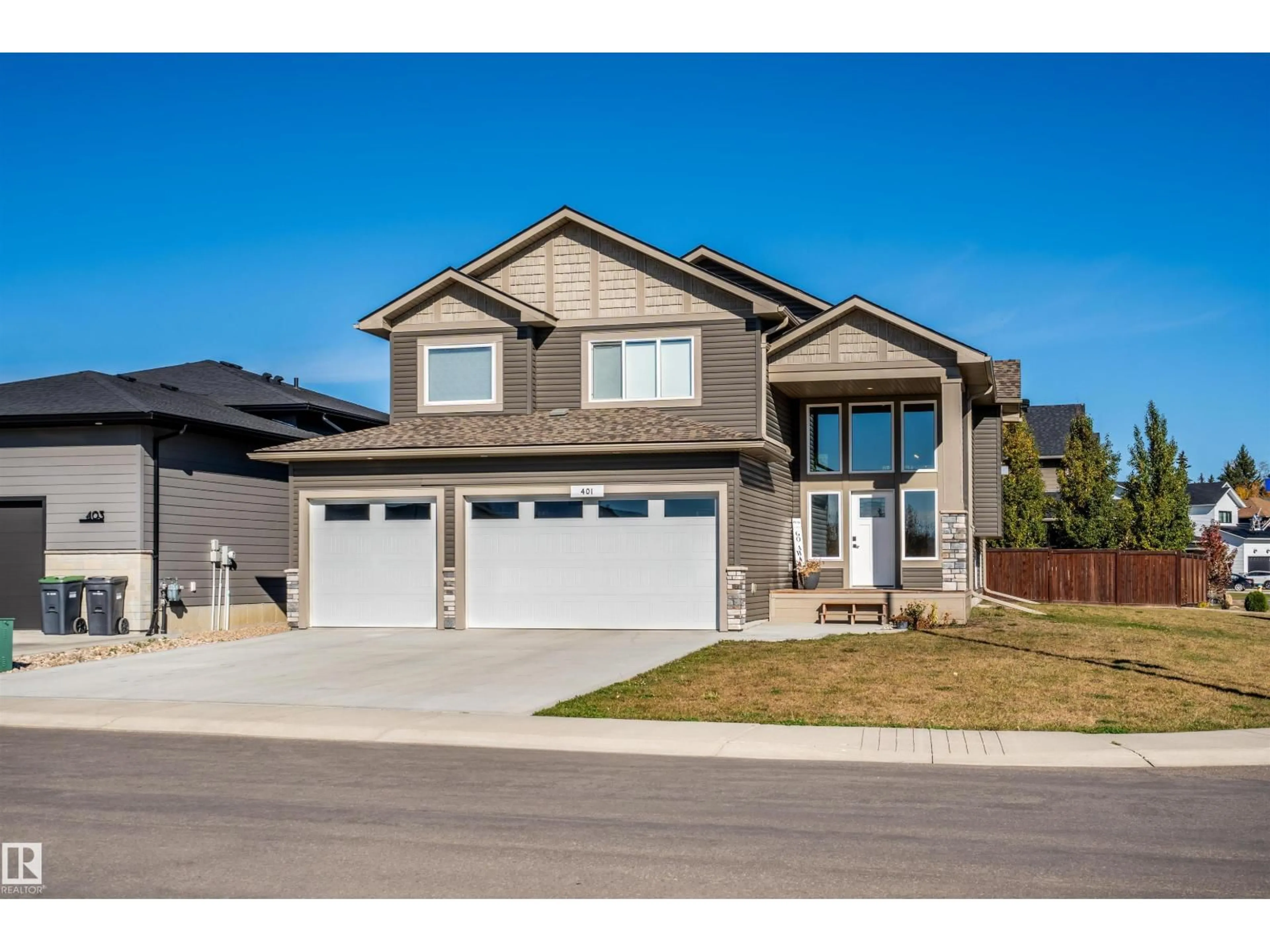 Home with vinyl exterior material, street for SW - 401 LAKEWOOD WY, Cold Lake Alberta T9M0K7