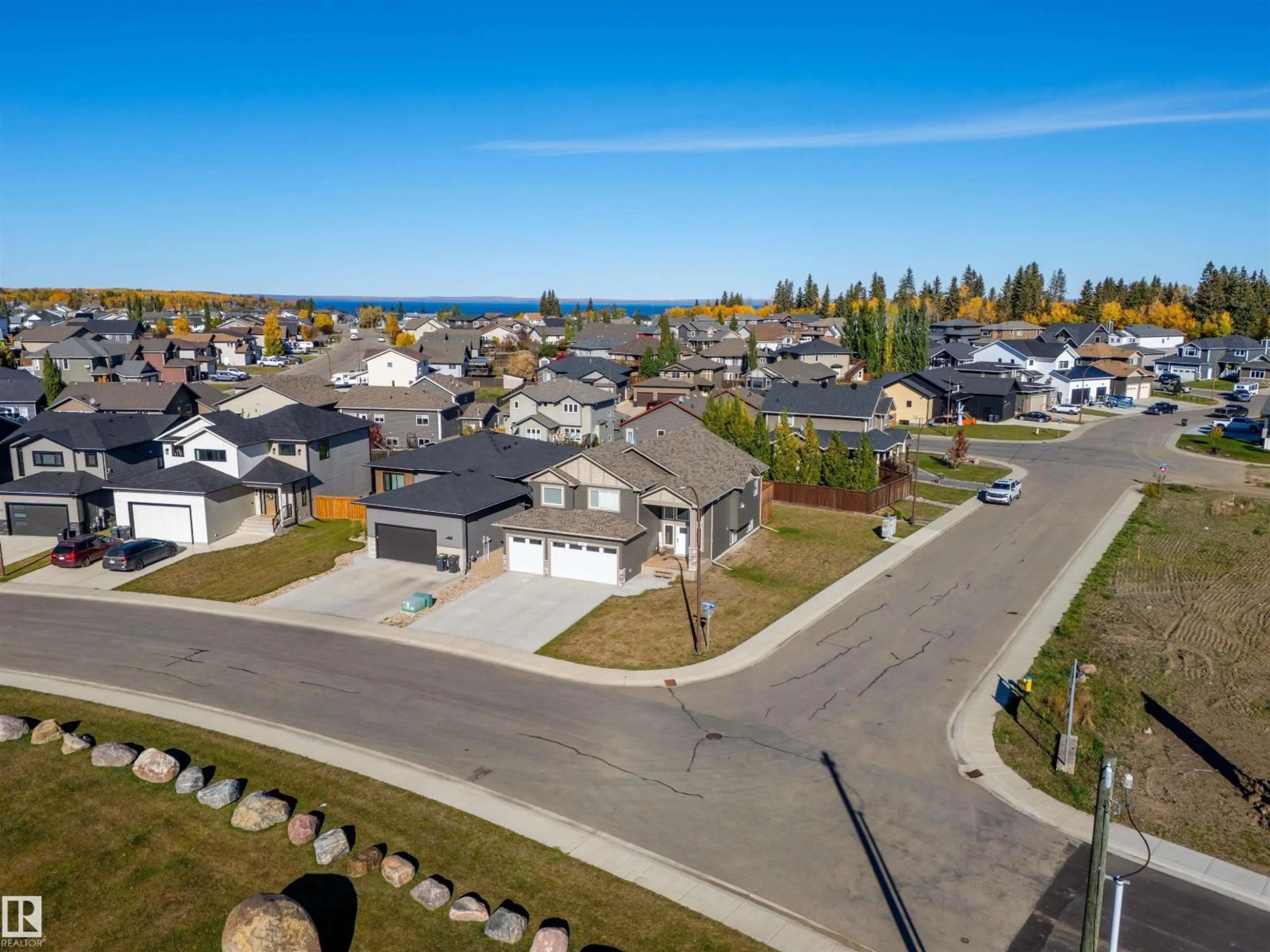 A pic from outside/outdoor area/front of a property/back of a property/a pic from drone, street for SW - 401 LAKEWOOD WY, Cold Lake Alberta T9M0K7