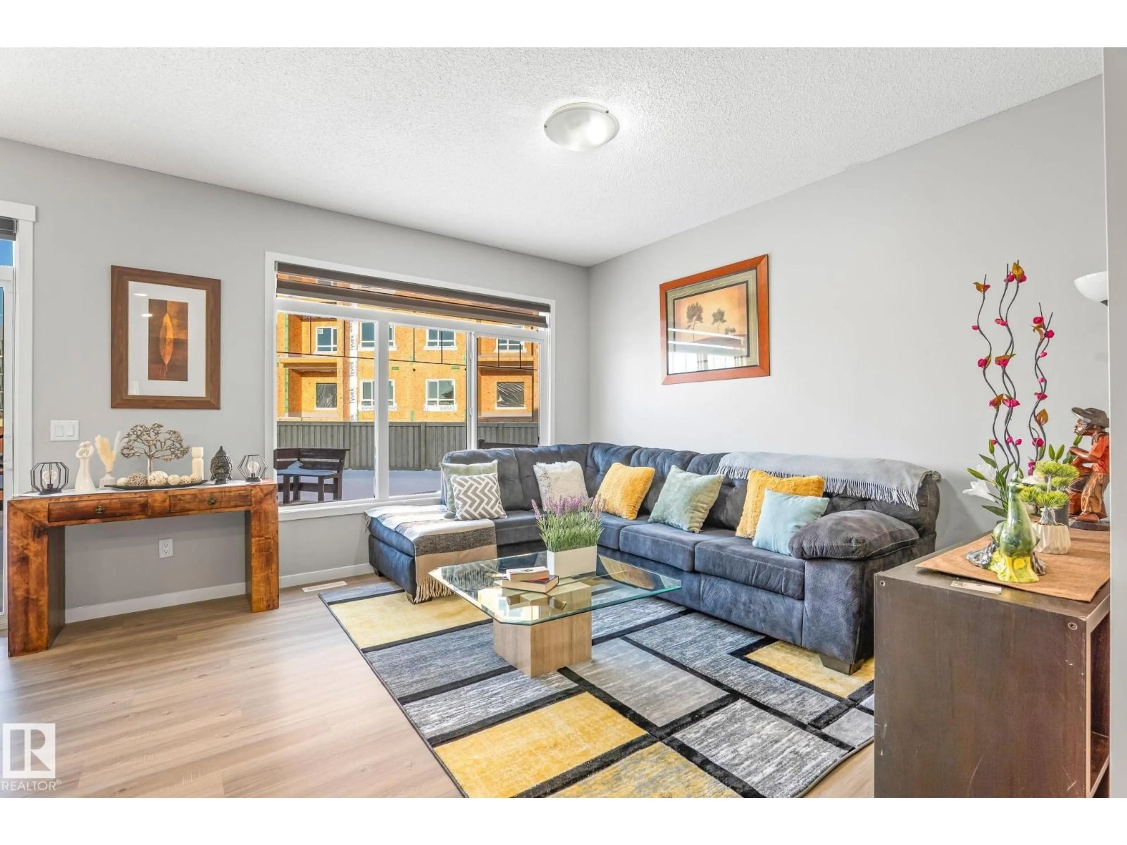 Living room with furniture, unknown for 4867 ALWOOD POINT SW, Edmonton Alberta T6W4N1