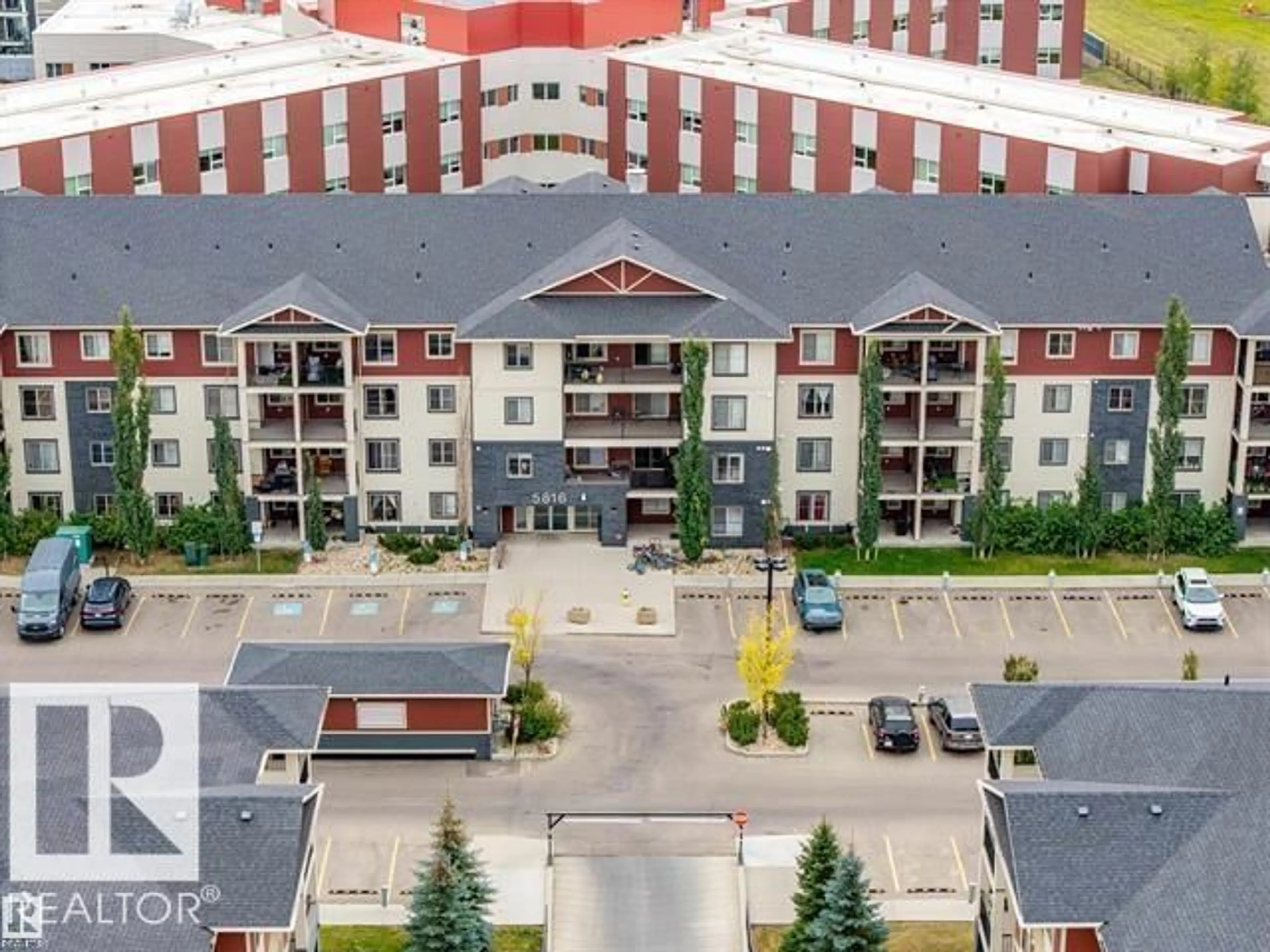 A pic from outside/outdoor area/front of a property/back of a property/a pic from drone, city buildings view from balcony for 202 - 5816 MULLEN PL, Edmonton Alberta T6R0W3