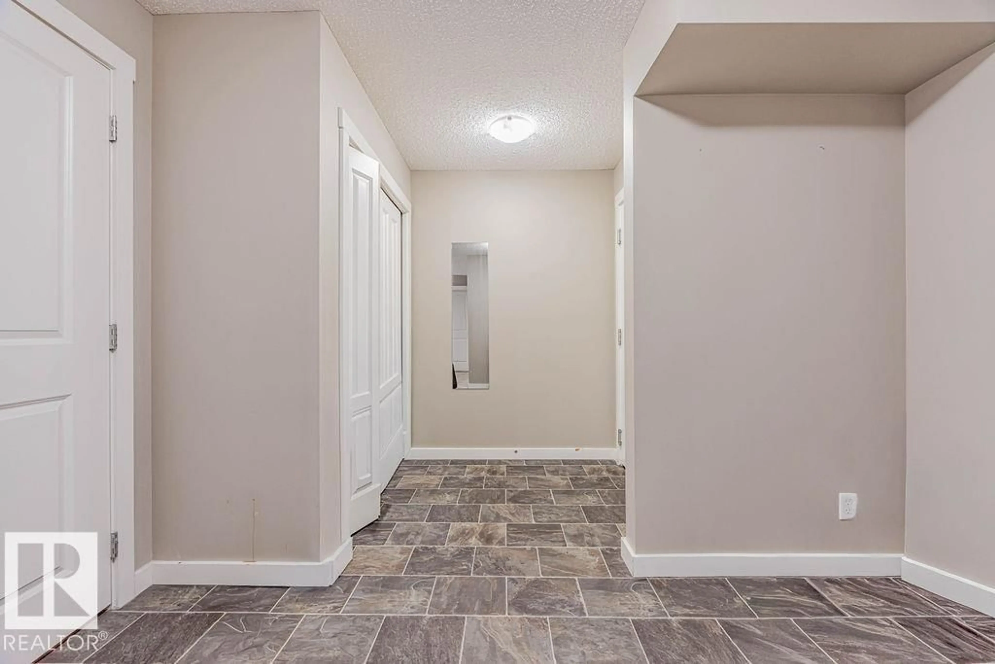 Indoor entryway for 202 - 5816 MULLEN PL, Edmonton Alberta T6R0W3