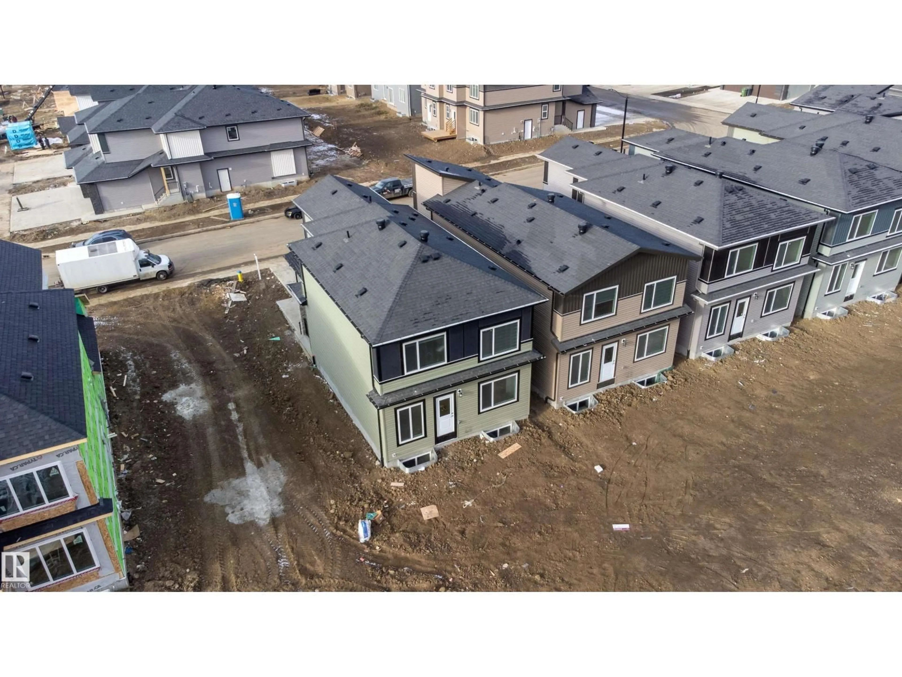 A pic from outside/outdoor area/front of a property/back of a property/a pic from drone, unknown for 4007 36 ST, Beaumont Alberta T4X3H3