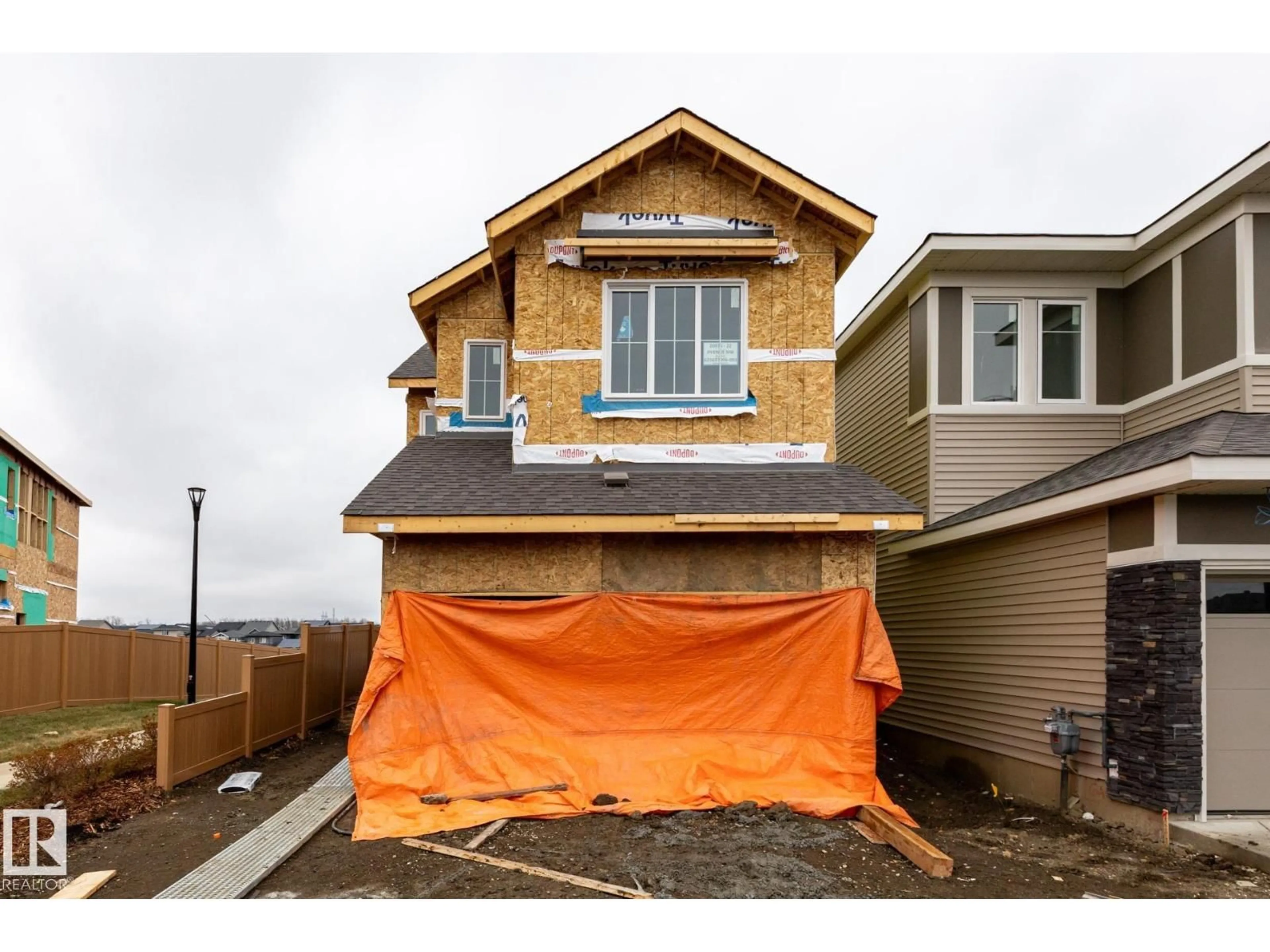 Home with vinyl exterior material, building for NW - 20976 22 ST, Edmonton Alberta T6M3H7