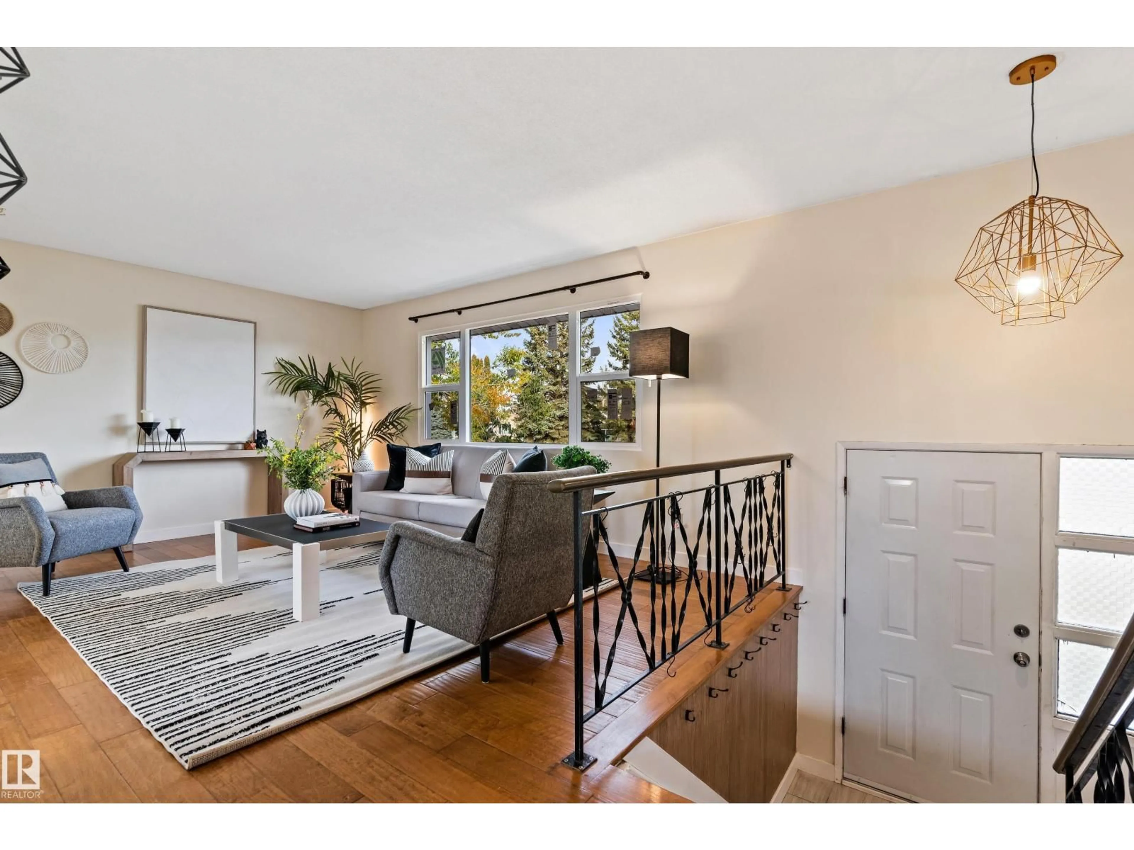 Living room with furniture, unknown for 7203 93 AV, Edmonton Alberta T6B1B2