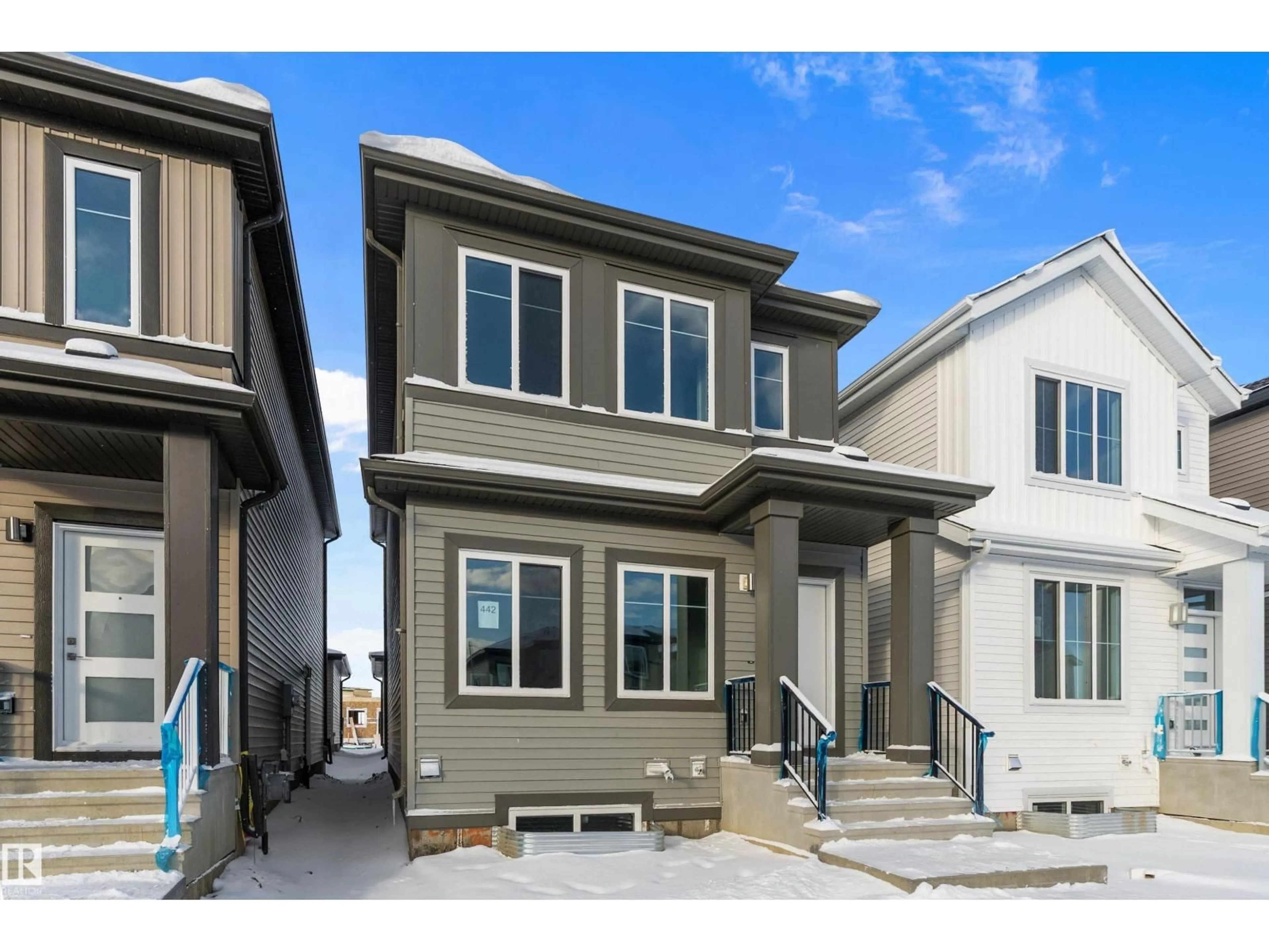 Home with vinyl exterior material, street for 442 CRYSTAL CREEK LI, Leduc Alberta T9E0X5
