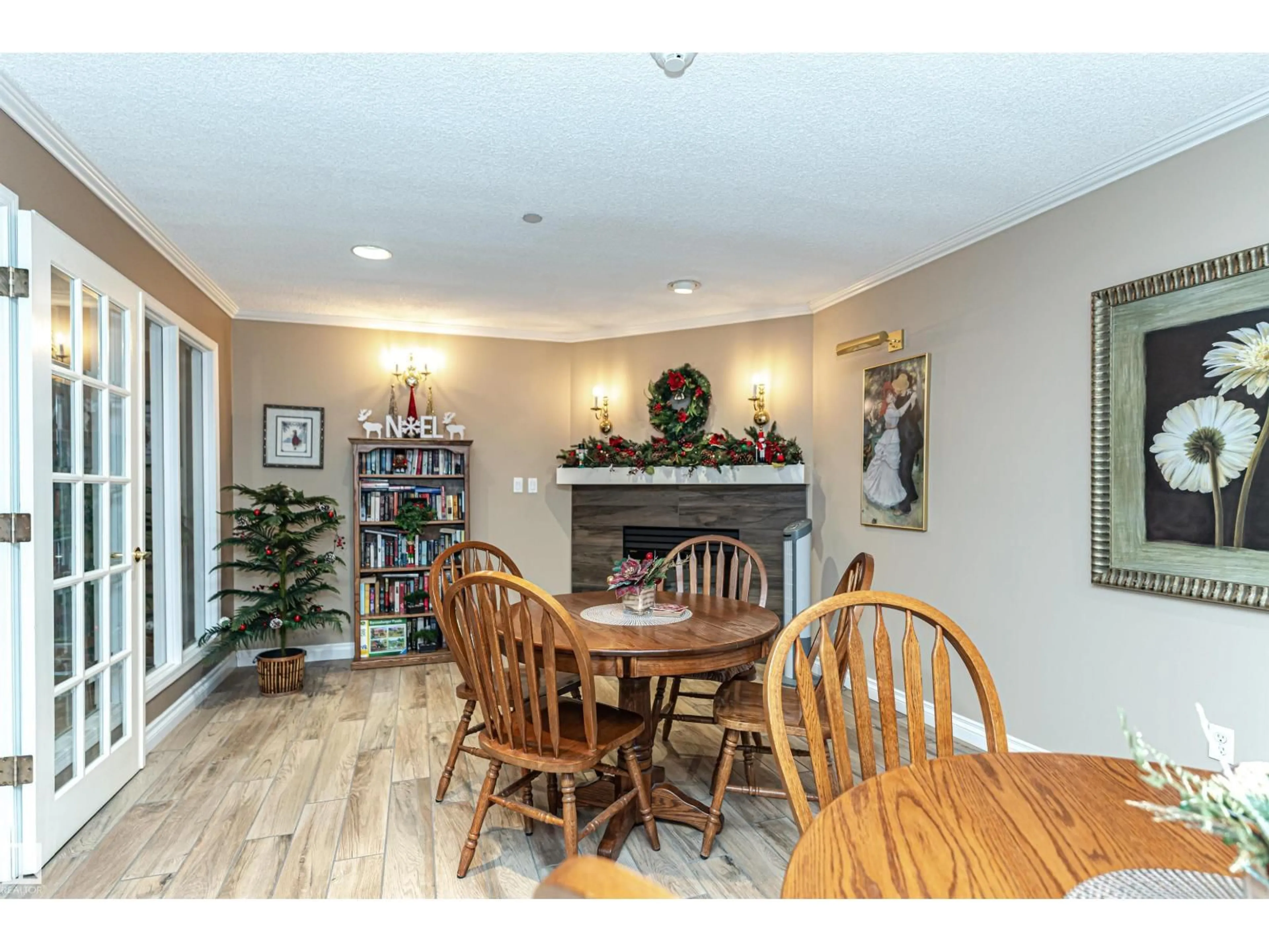 Dining room, wood/laminate floor for #304 - 20 ST JOSEPH ST, St. Albert Alberta T8N6M5