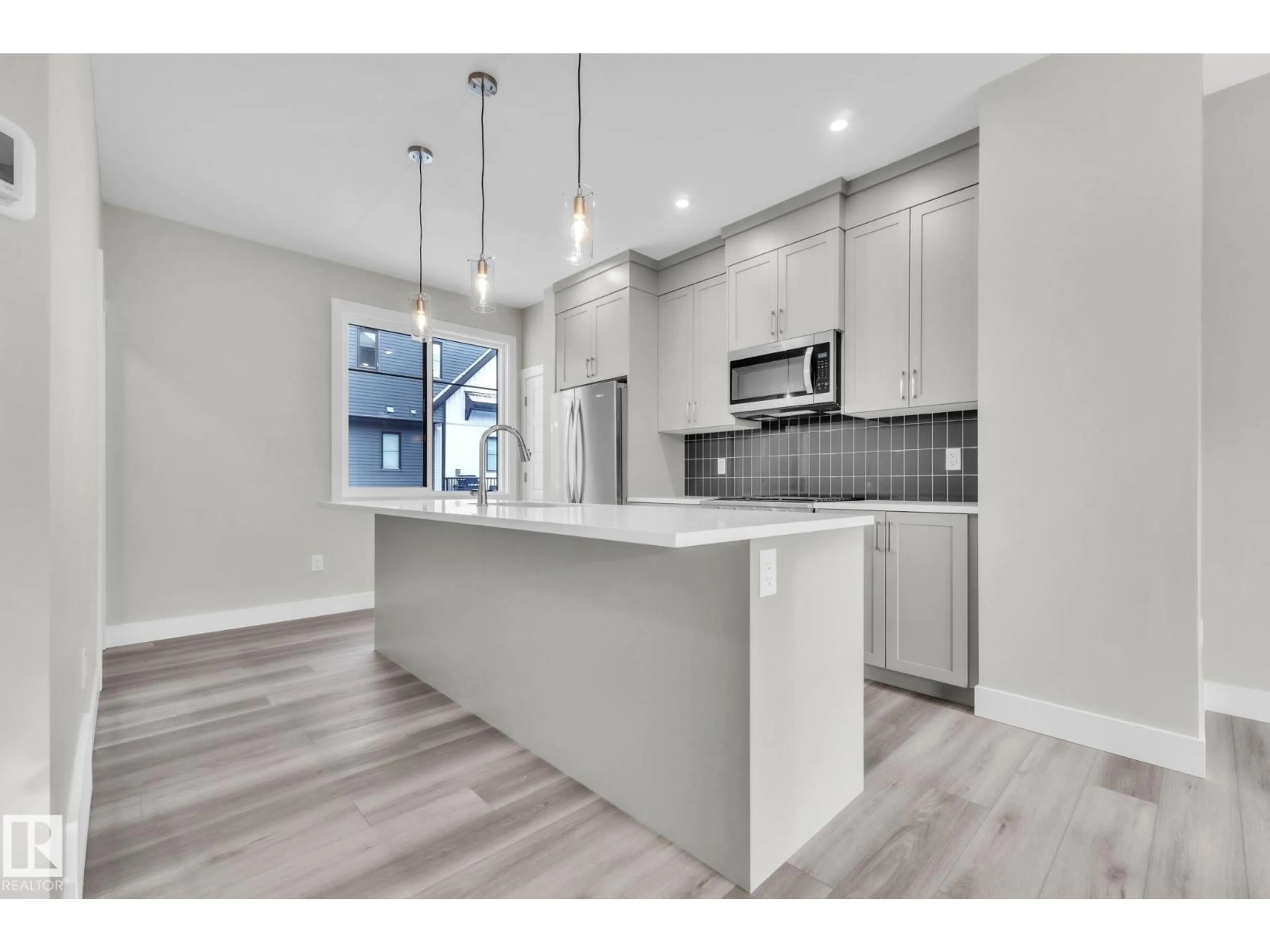 Open concept kitchen, unknown for #7 - 6905 25 AV, Edmonton Alberta T6X3B7