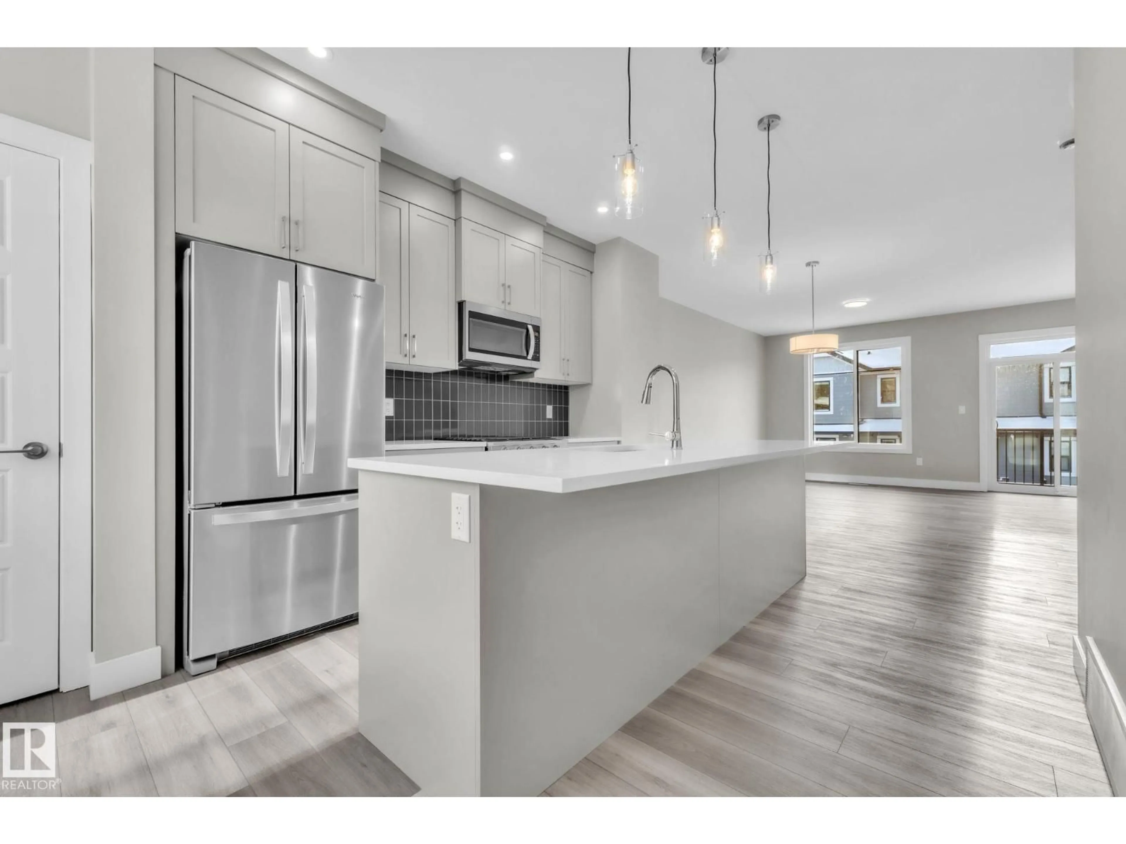 Open concept kitchen, unknown for #7 - 6905 25 AV, Edmonton Alberta T6X3B7