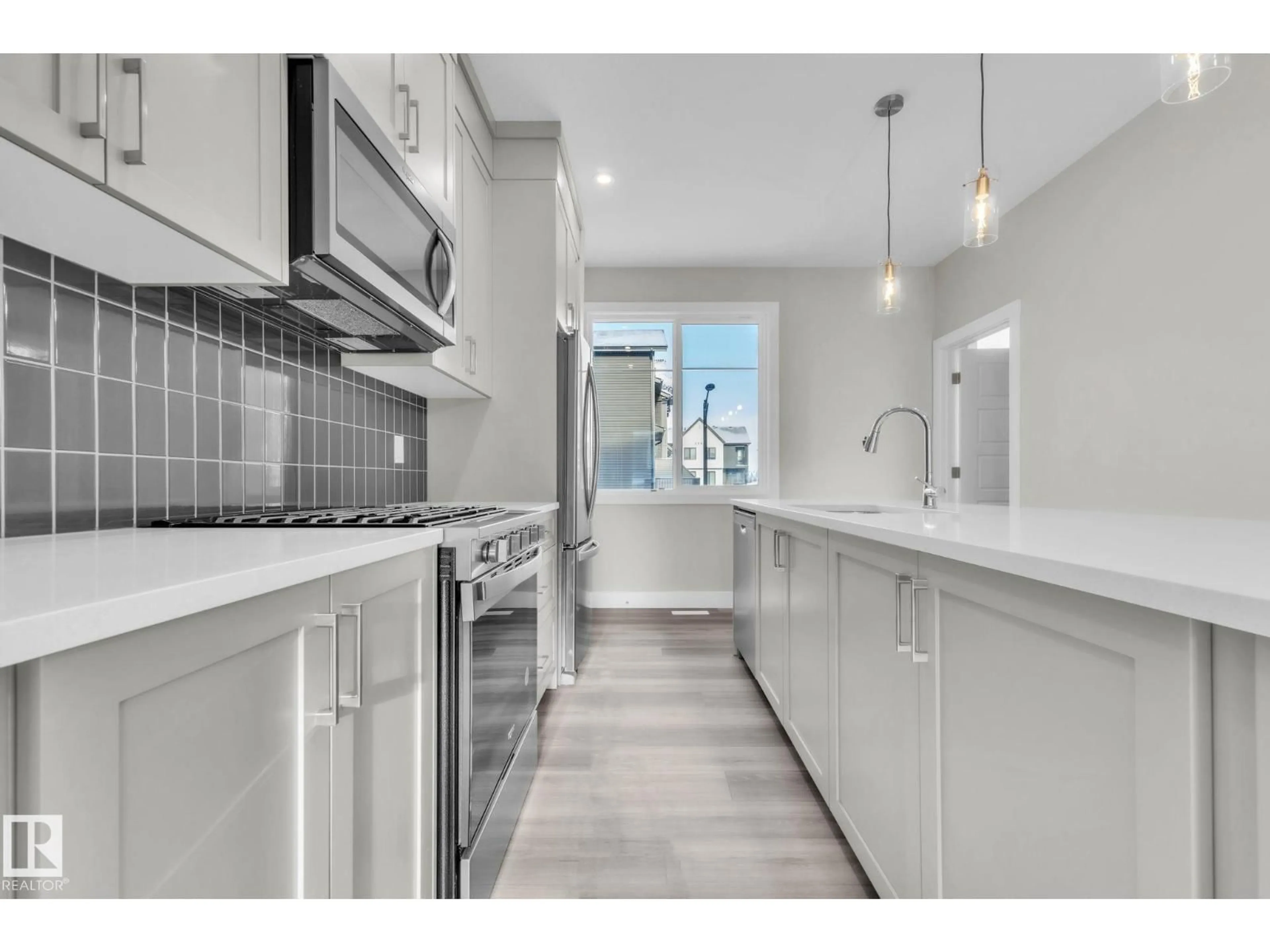 Open concept kitchen, unknown for #15 - 6905 25 AV, Edmonton Alberta T6X3B7