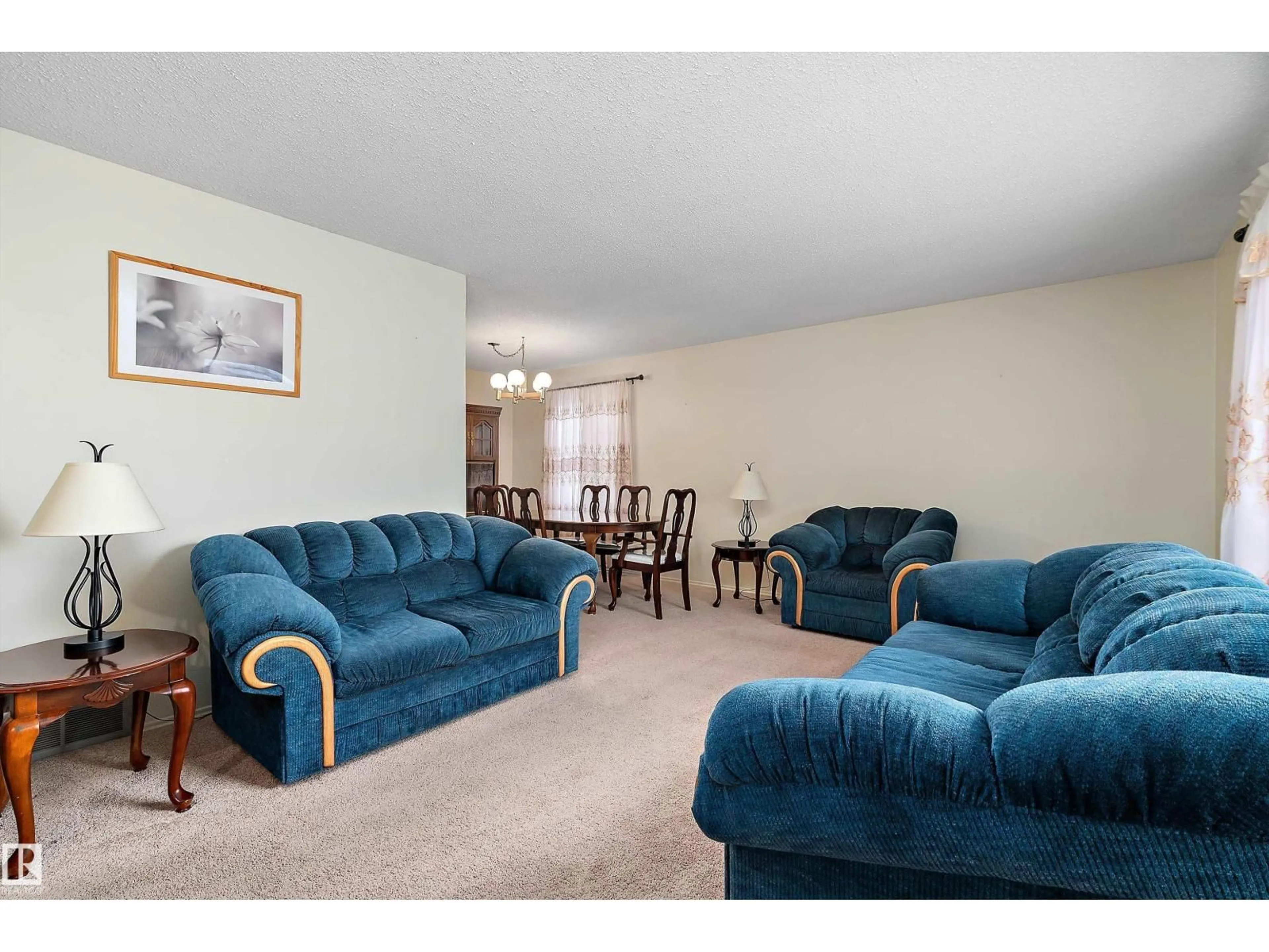 Living room with furniture, carpet floor for 5625 55A ST, Wetaskiwin Alberta T9A2A8