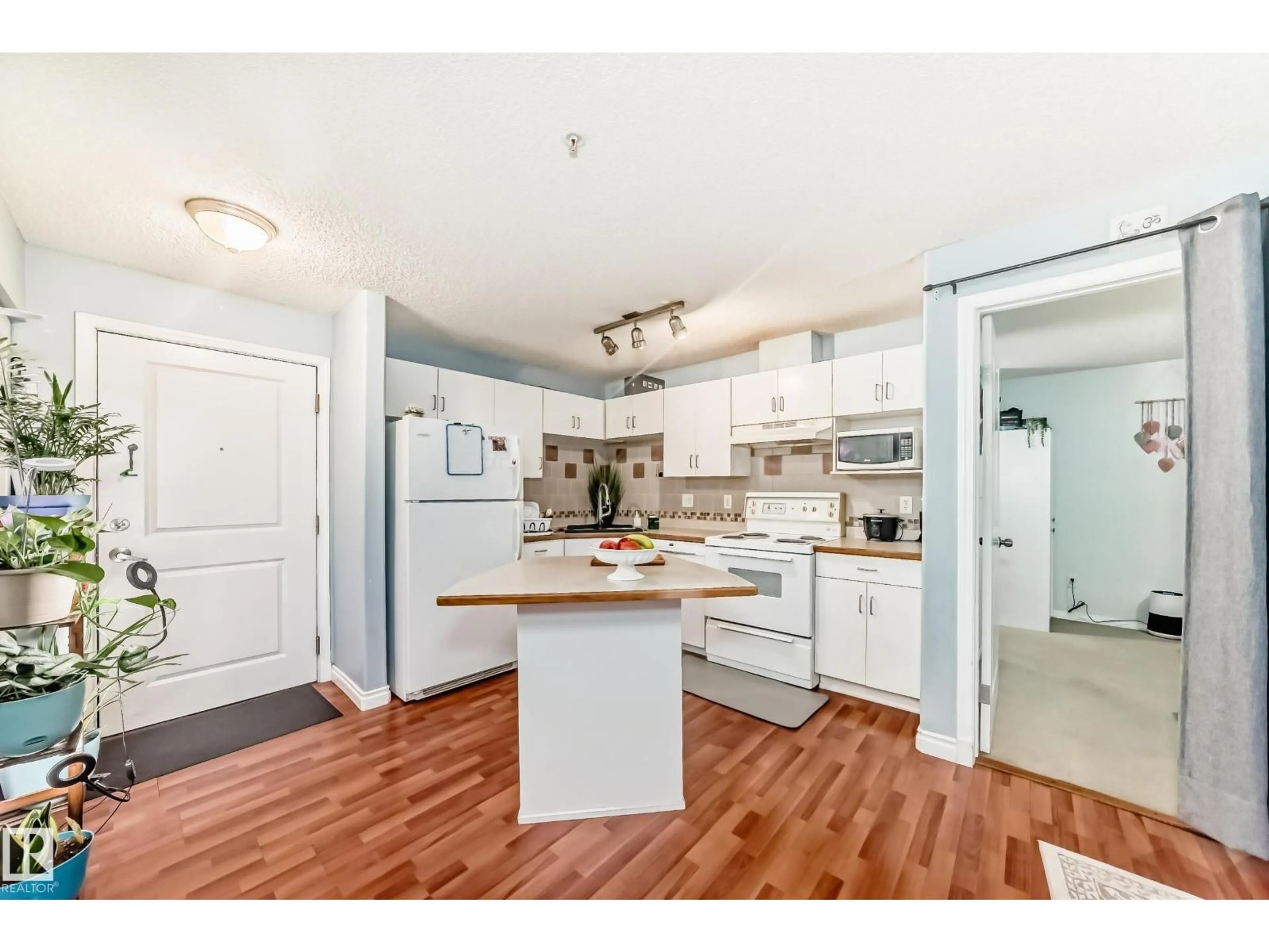 Open concept kitchen, unknown for #108 - 10535 122 ST, Edmonton Alberta T5N4B7