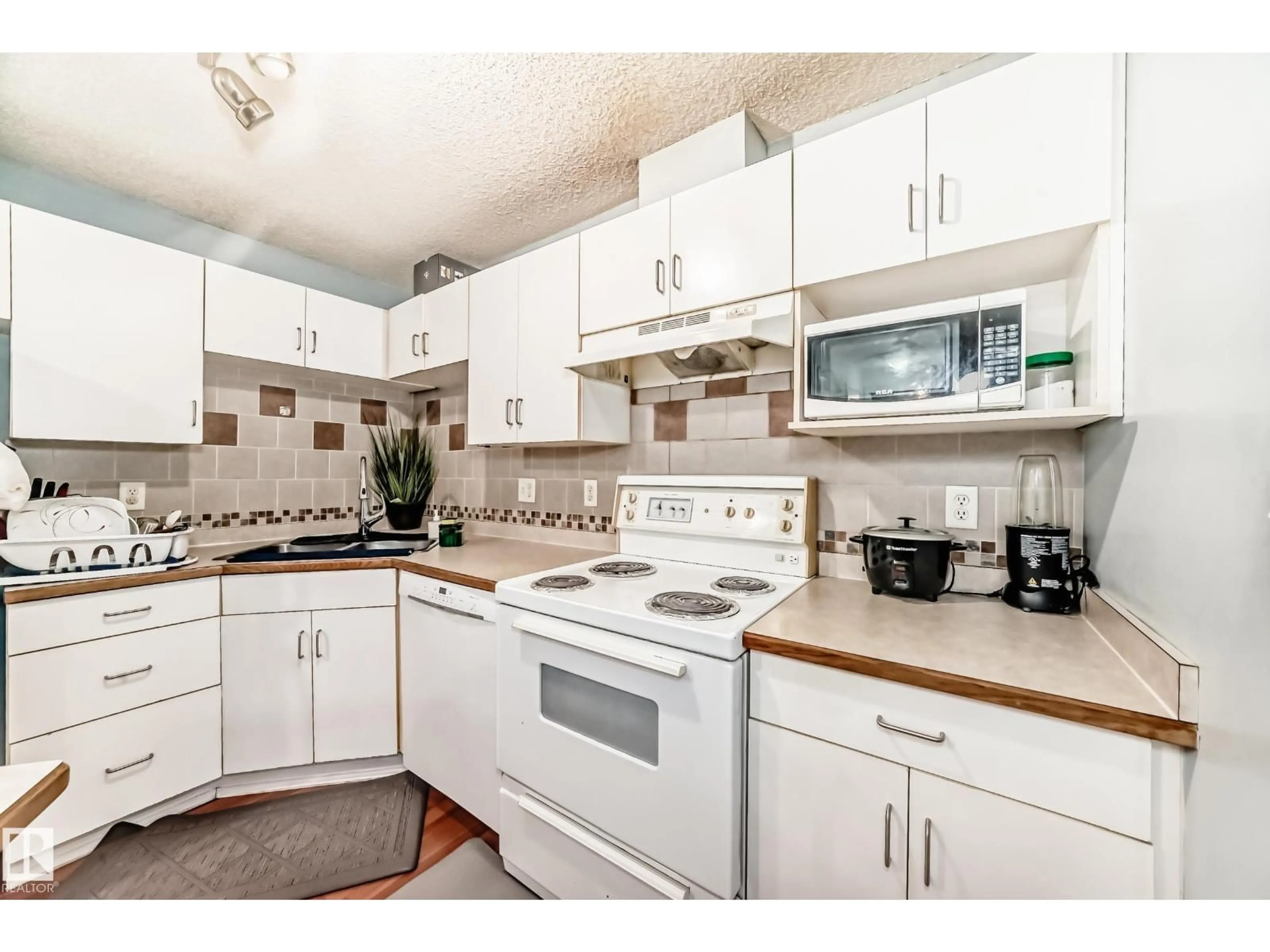 Standard kitchen, unknown for #108 - 10535 122 ST, Edmonton Alberta T5N4B7