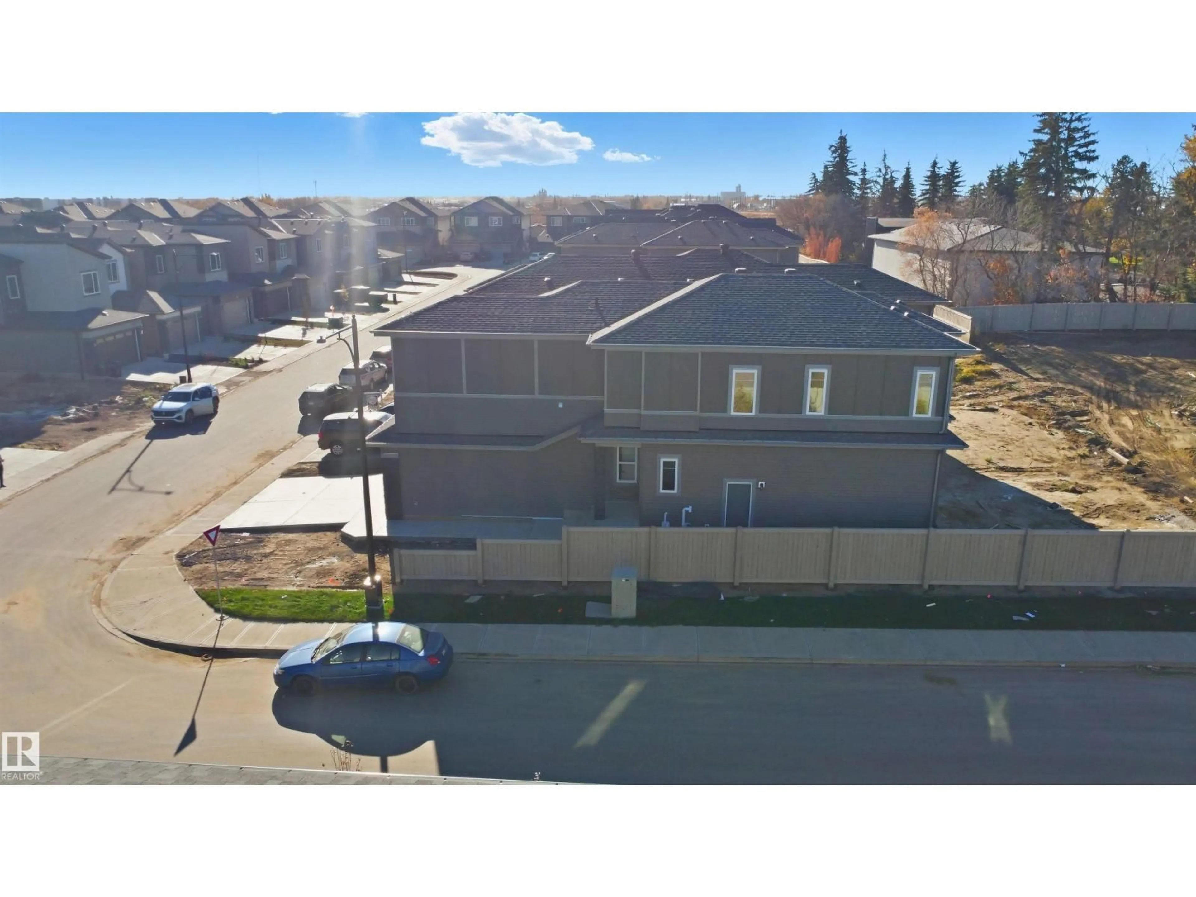 A pic from outside/outdoor area/front of a property/back of a property/a pic from drone, street for LI NW - 1558 SISKIN LINK, Edmonton Alberta T5S0V1