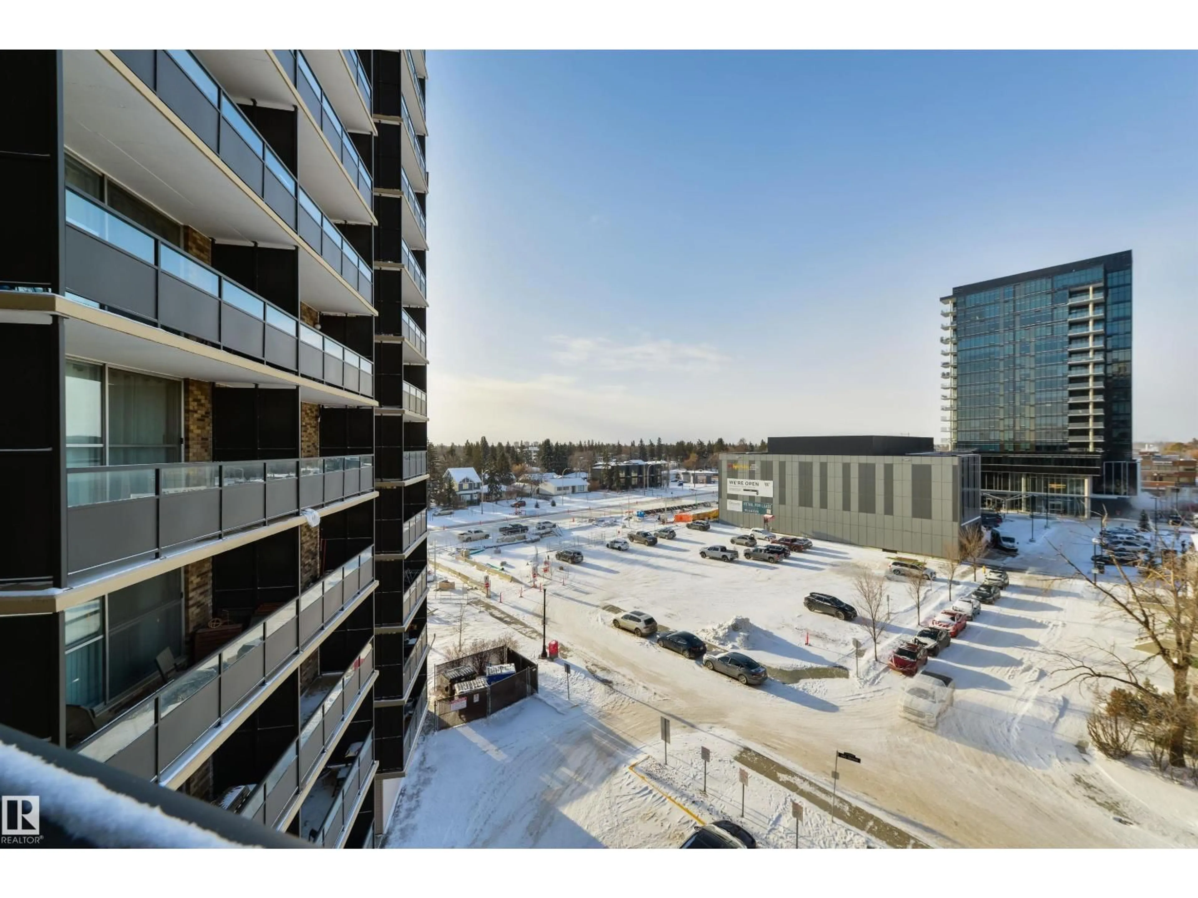 A pic from outside/outdoor area/front of a property/back of a property/a pic from drone, city buildings view from balcony for 601 STONY PLAIN RD, Edmonton Alberta T5N3R2