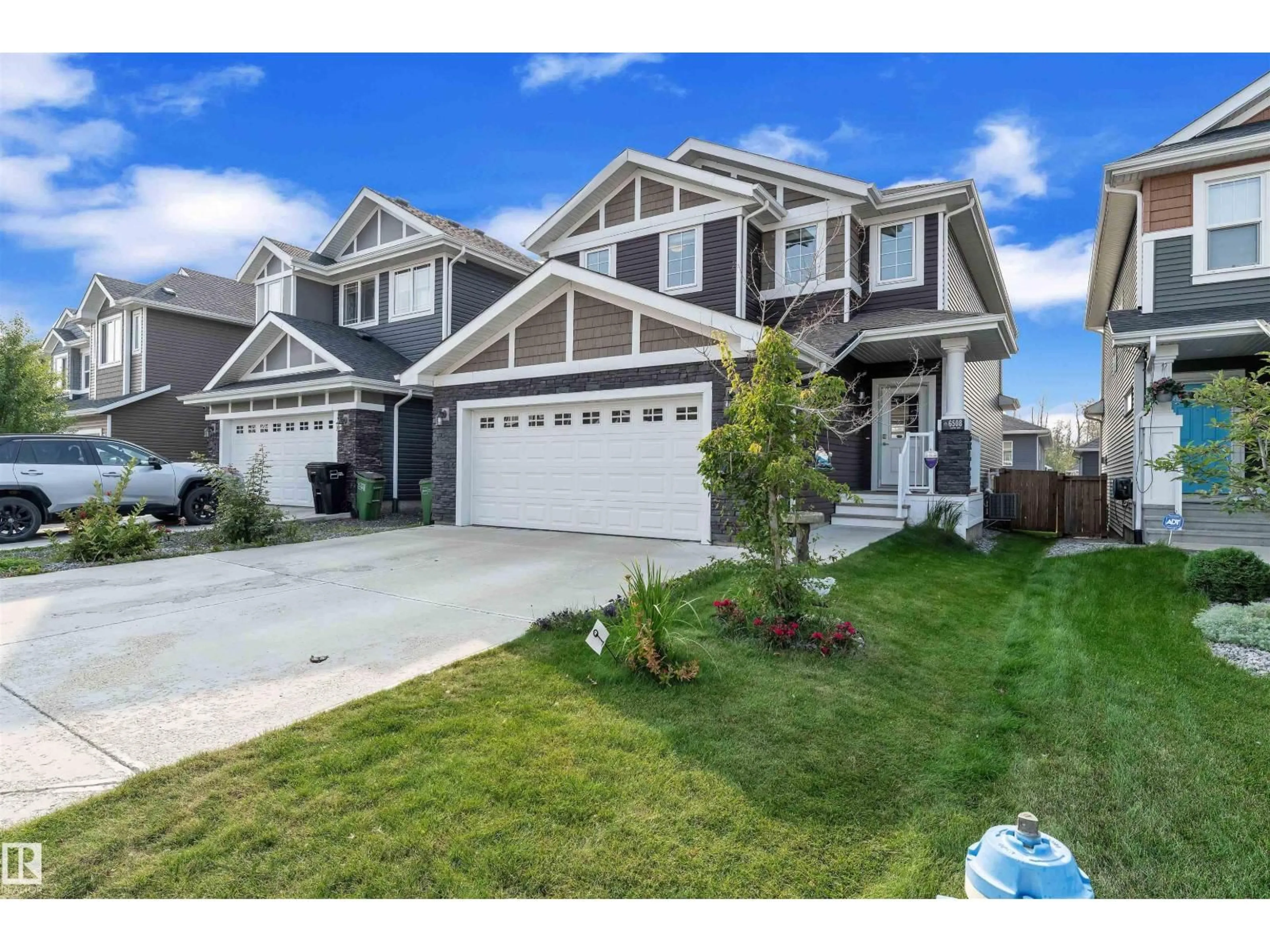 Home with vinyl exterior material, street for NW - 6508 ELSTON LO, Edmonton Alberta T6M0V9