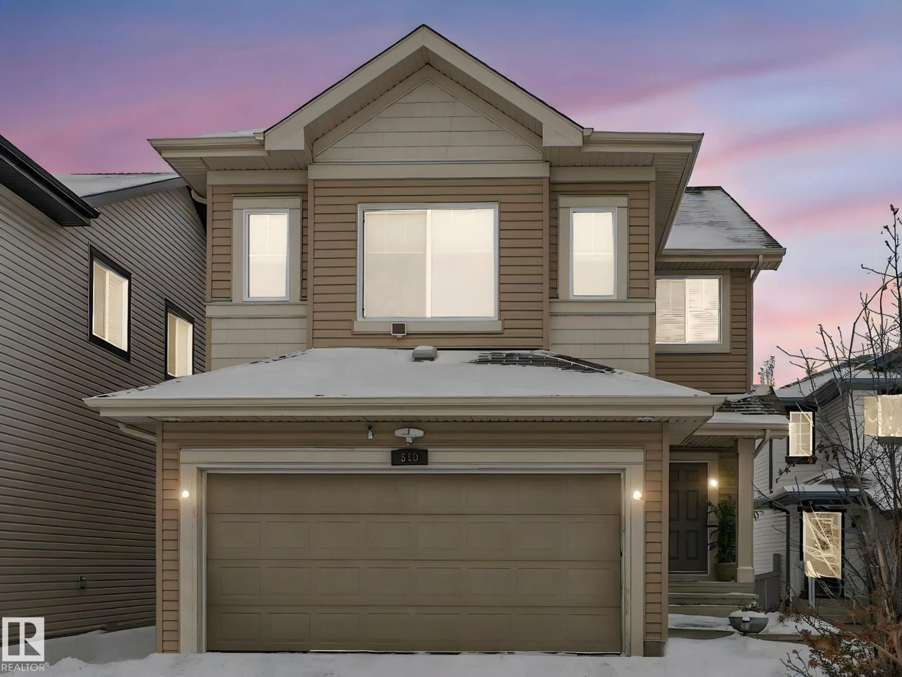 Home with vinyl exterior material, street for SW - 540 59 ST, Edmonton Alberta T6X0E9